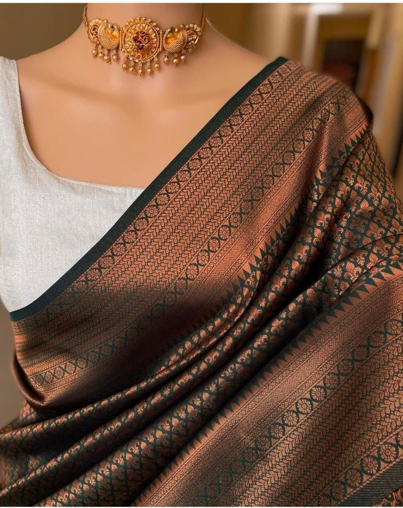 Demanding Green Soft Silk Saree With Demure Blouse Piece