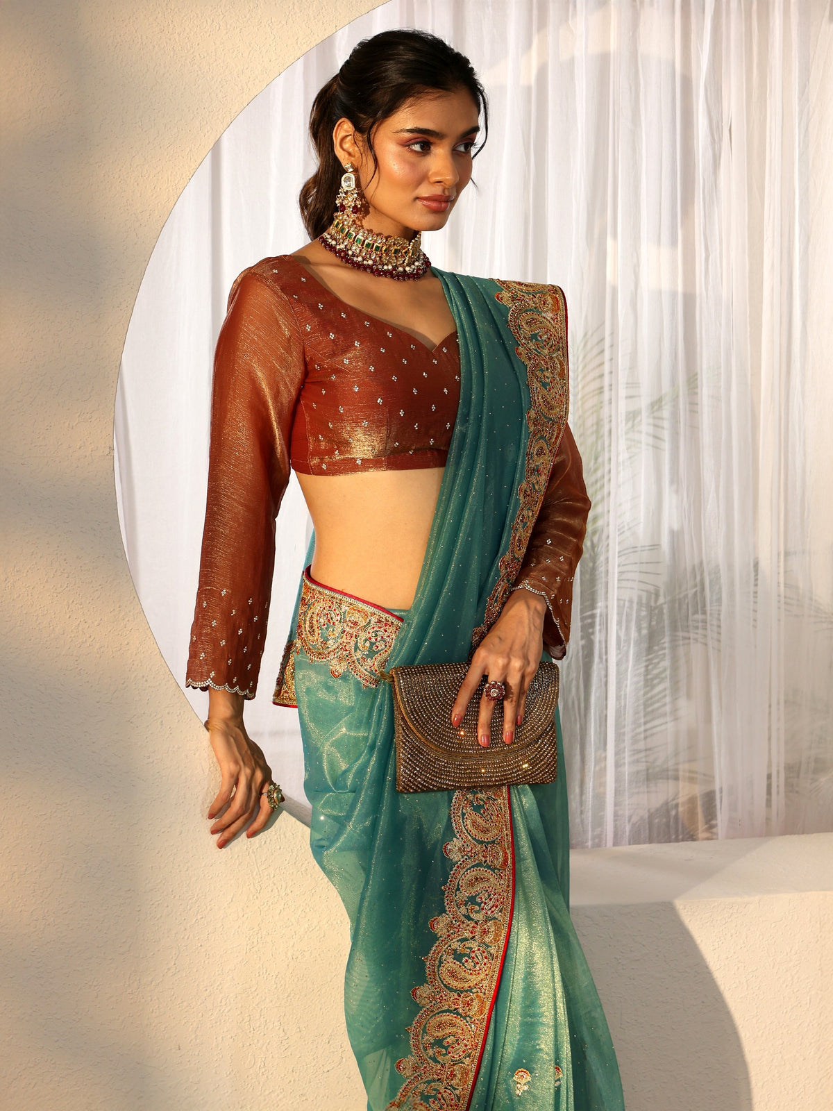 Anouk Aqua Blue Net Saree with Embellished Paisley Border