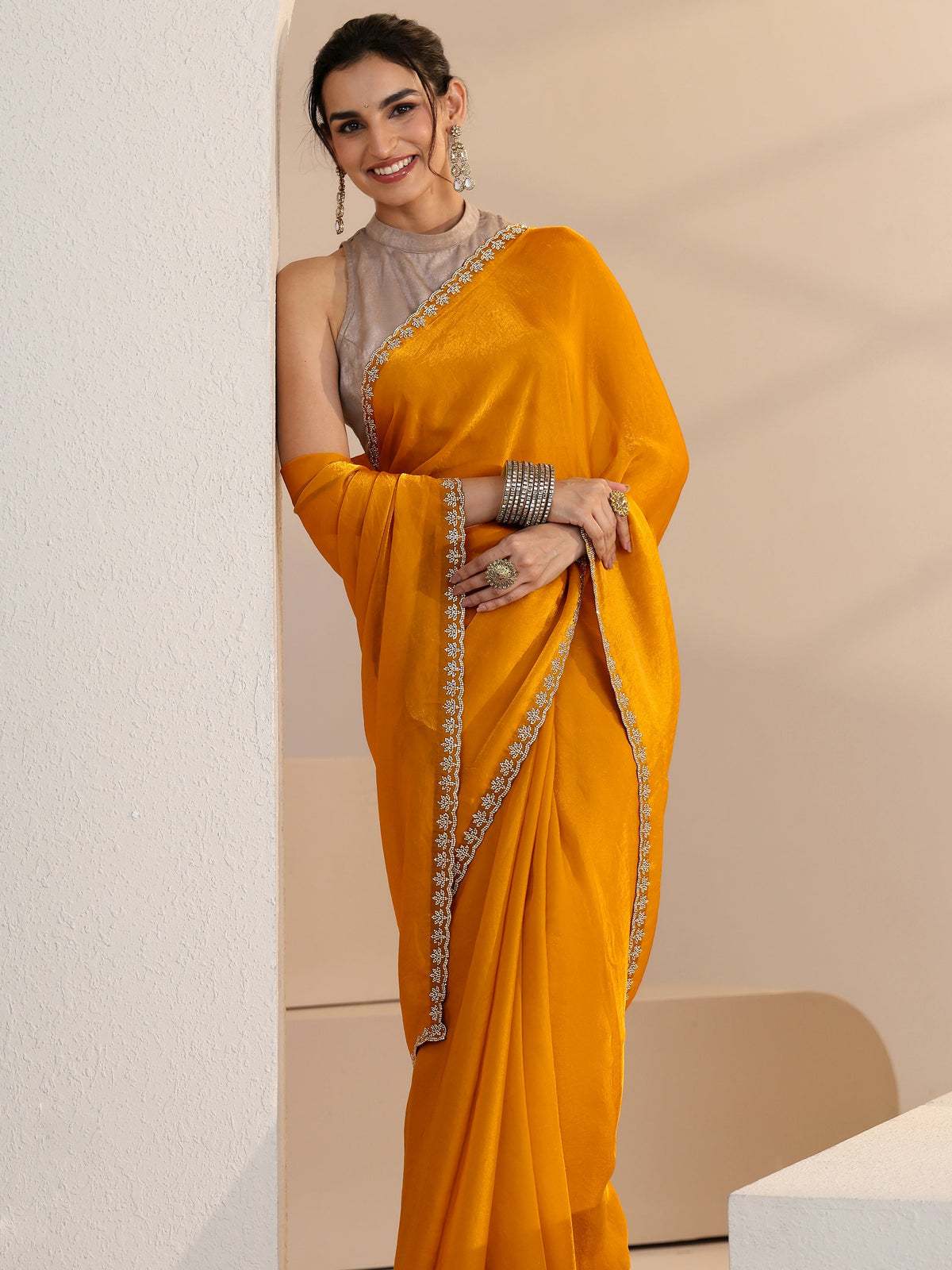 Anouk Mustard Yellow Tissue Saree with Stone Work Border