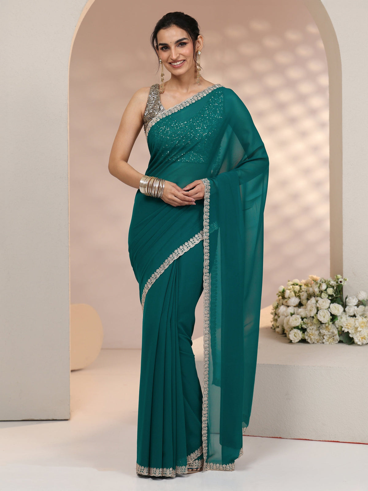 Anouk Teal Green Georgette Saree with Embroidered Border