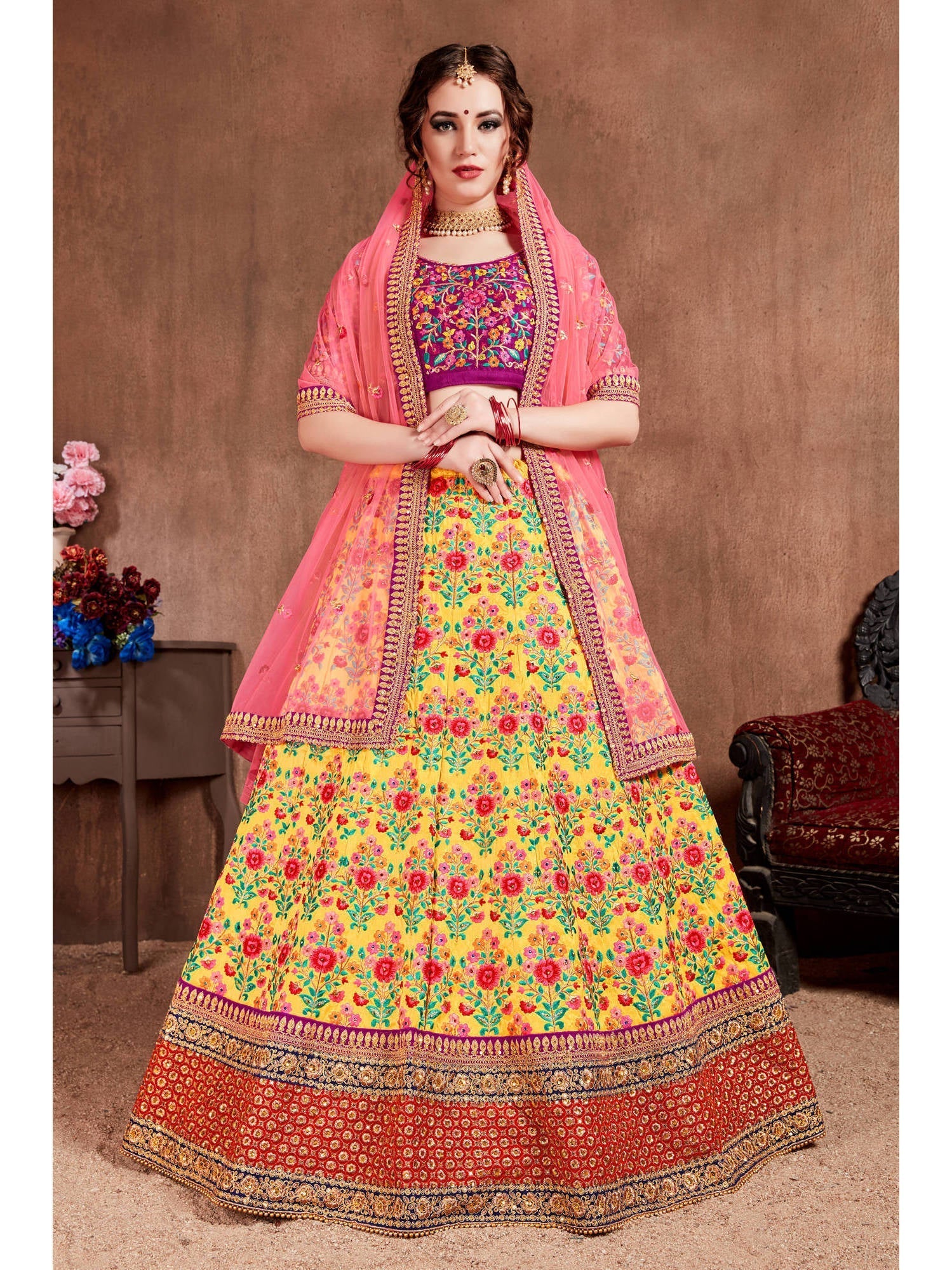 Lovely Yellow Colored Bridal Wear Embroidered Lehenga Choli
