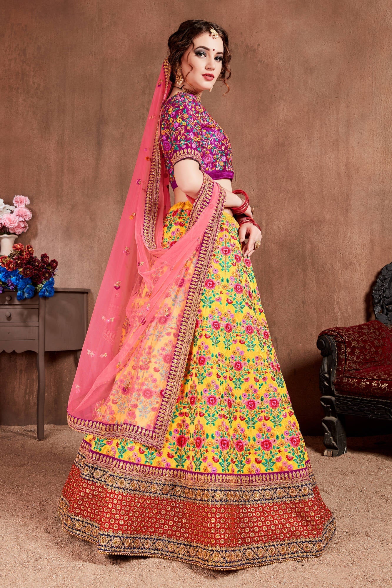 Lovely Yellow Colored Bridal Wear Embroidered Lehenga Choli