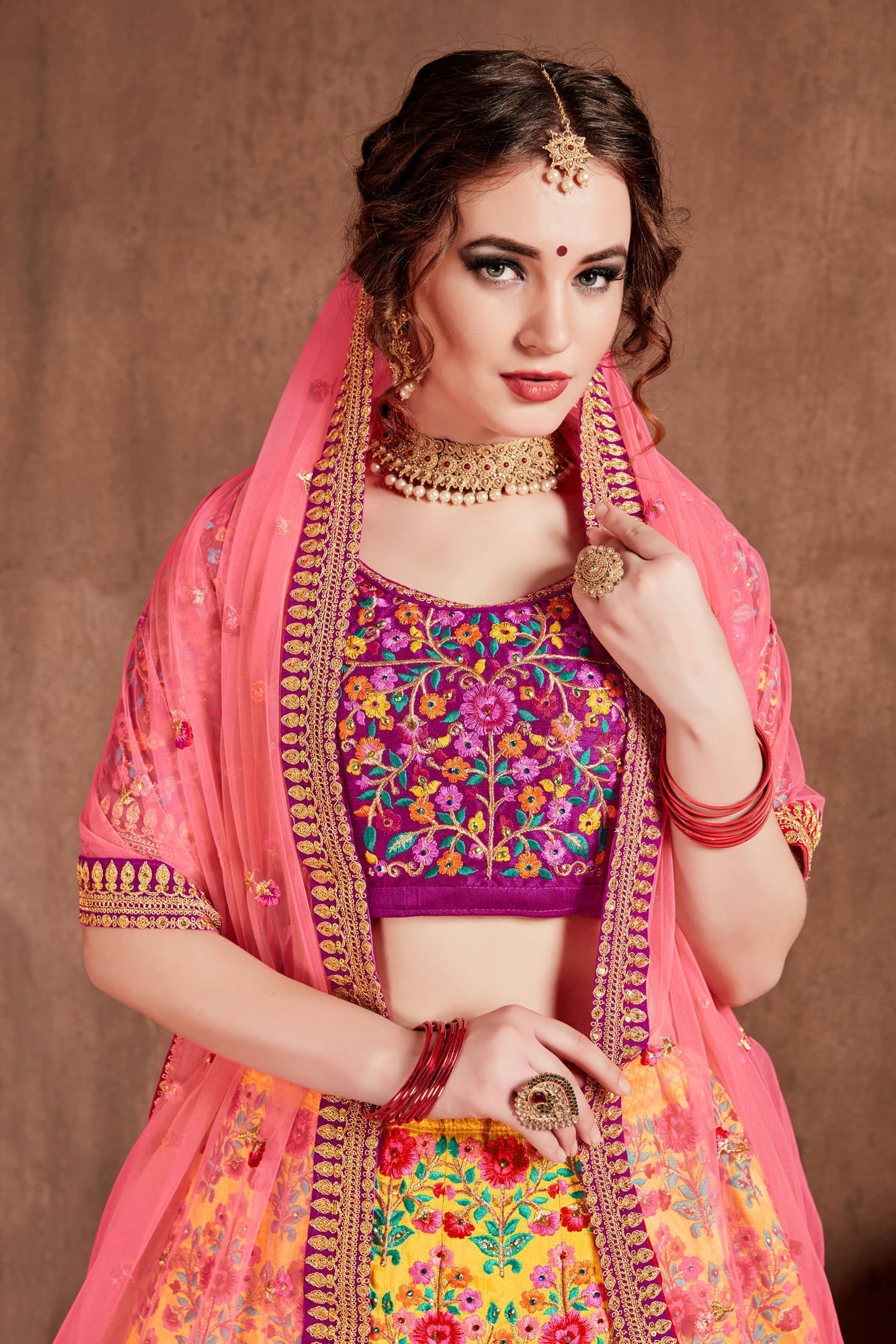 Lovely Yellow Colored Bridal Wear Embroidered Lehenga Choli