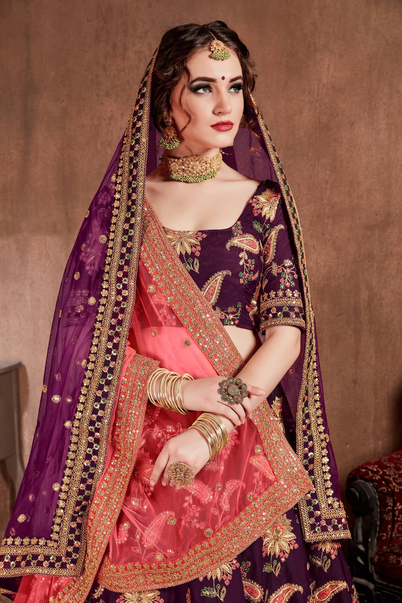 Alluring Purple Colored Bridal Wear Designer Embroidered Lehenga choli