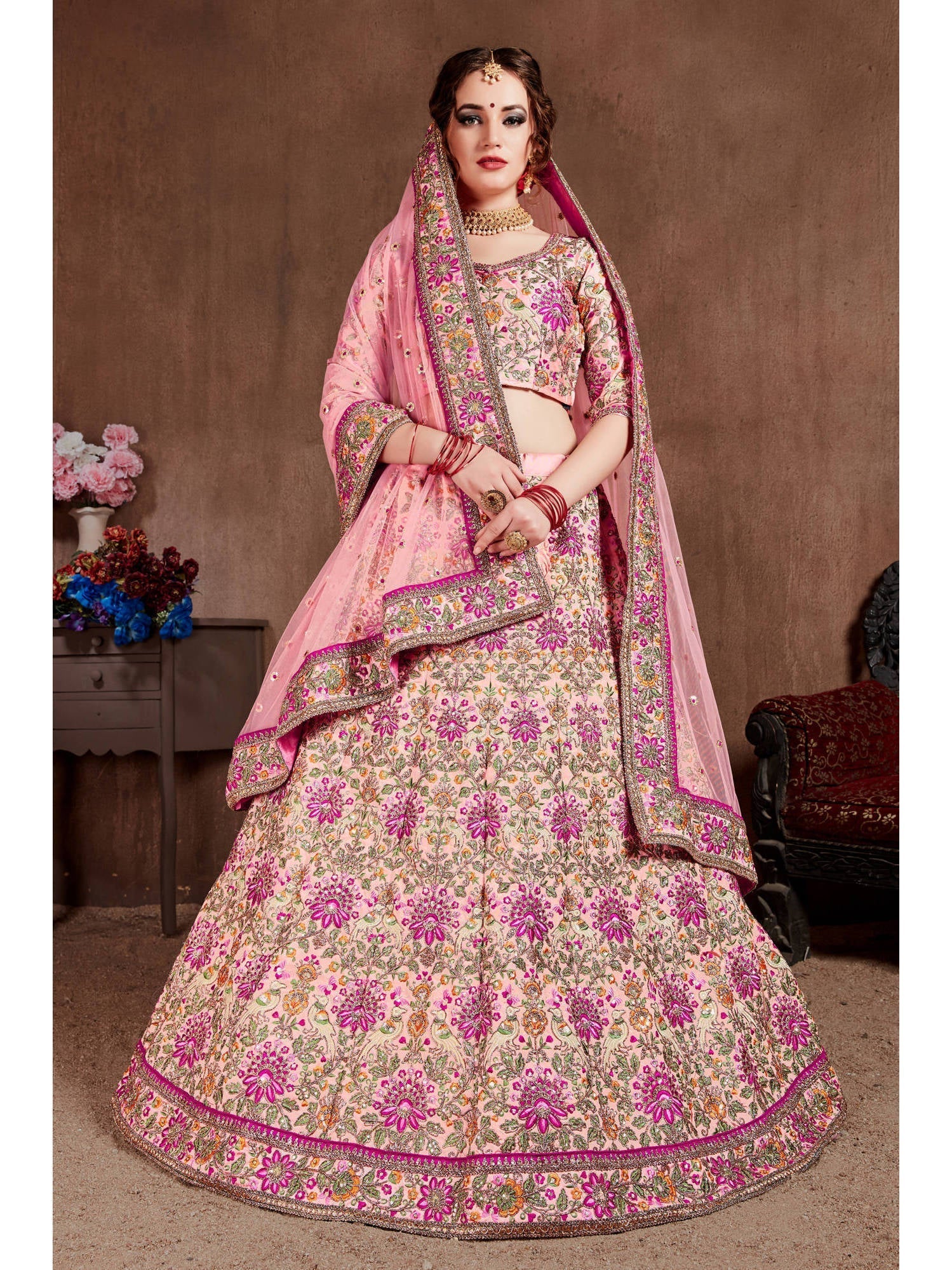 Arresting Pastel Pink Colored Bridal Wear Designer Embroidered Lehenga choli