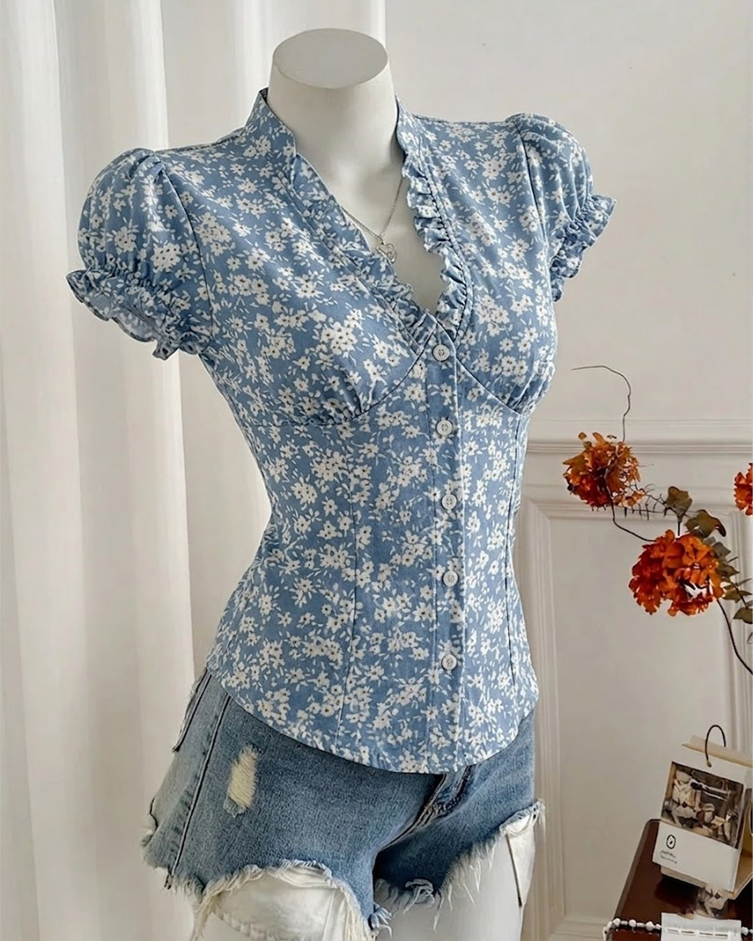 Ruffled V-Neck Curved Hem Floral Short Puff Sleeve Top in Slate Blue