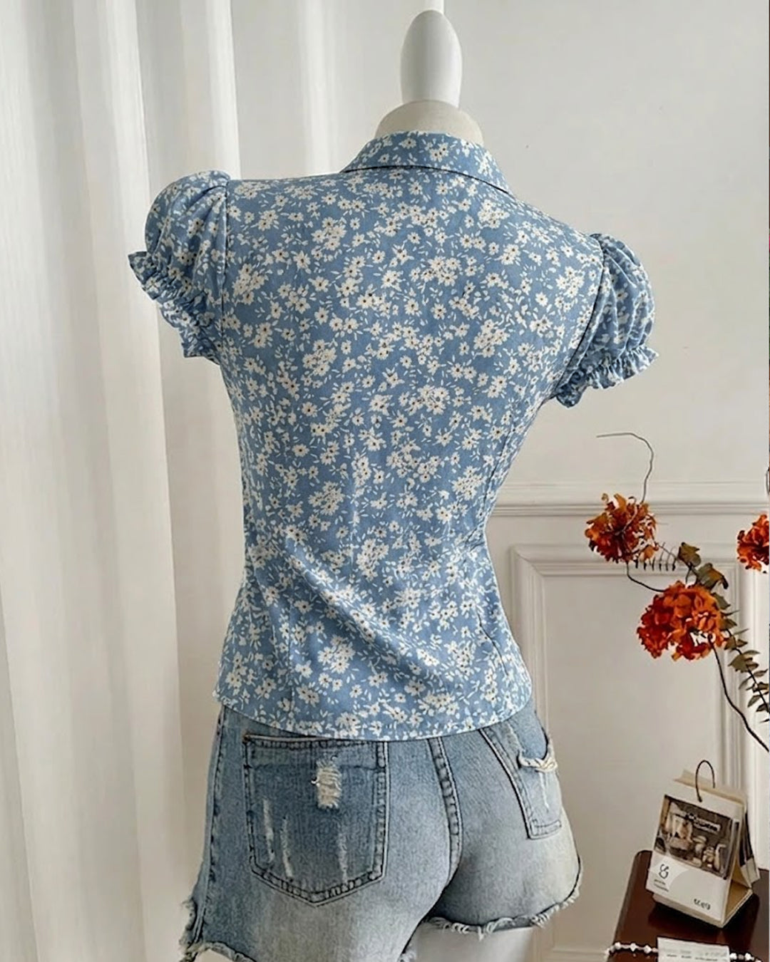 Ruffled V-Neck Curved Hem Floral Short Puff Sleeve Top in Slate Blue