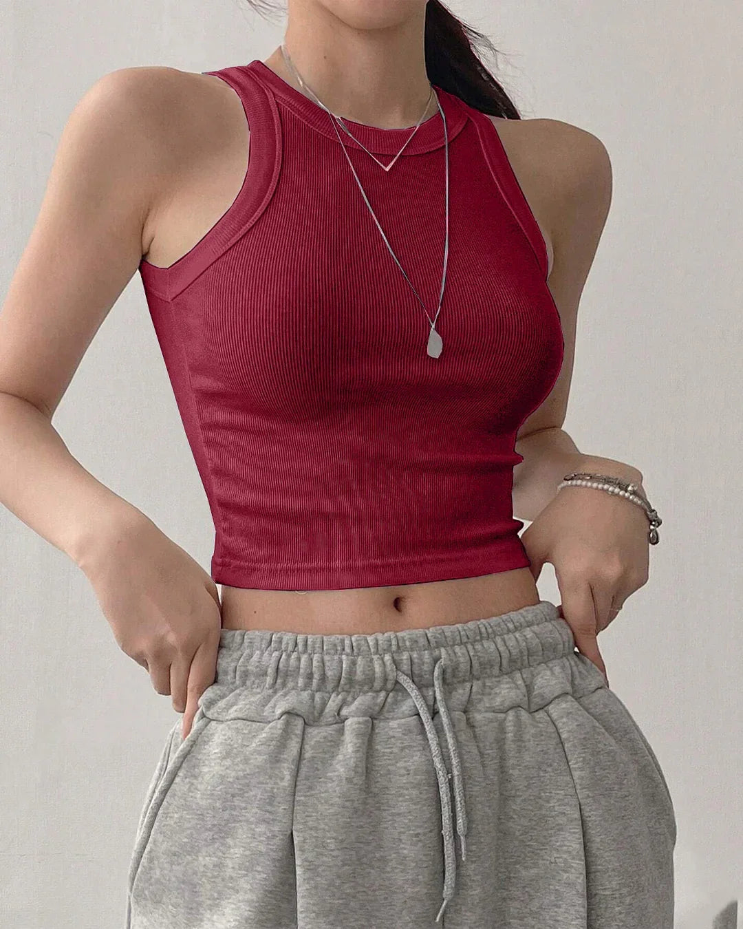 Sleeveless Ribbed High Neck Crop Top in Maroon