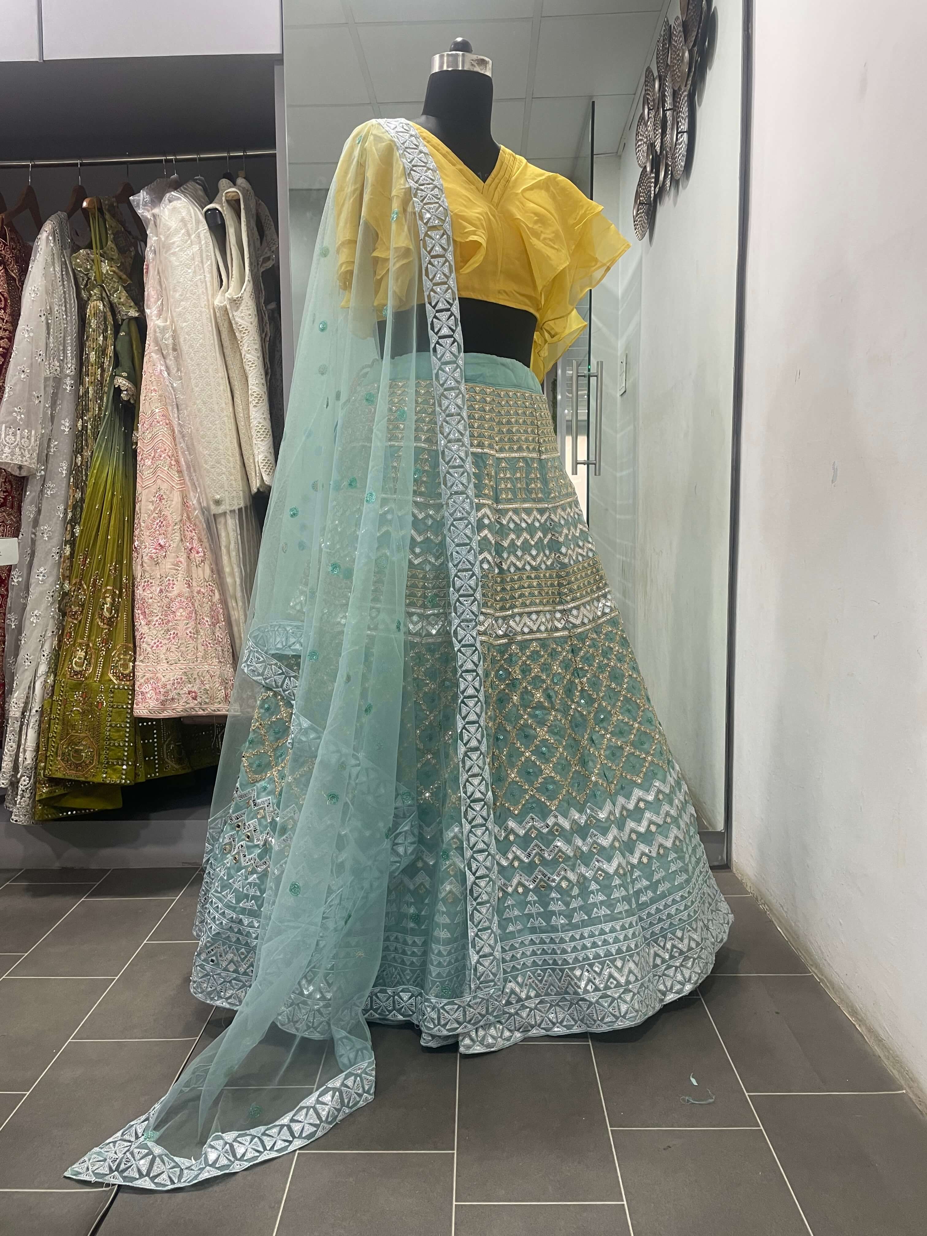 Turquoise Lehenga Choli in Organza With Thread And Sequence Work