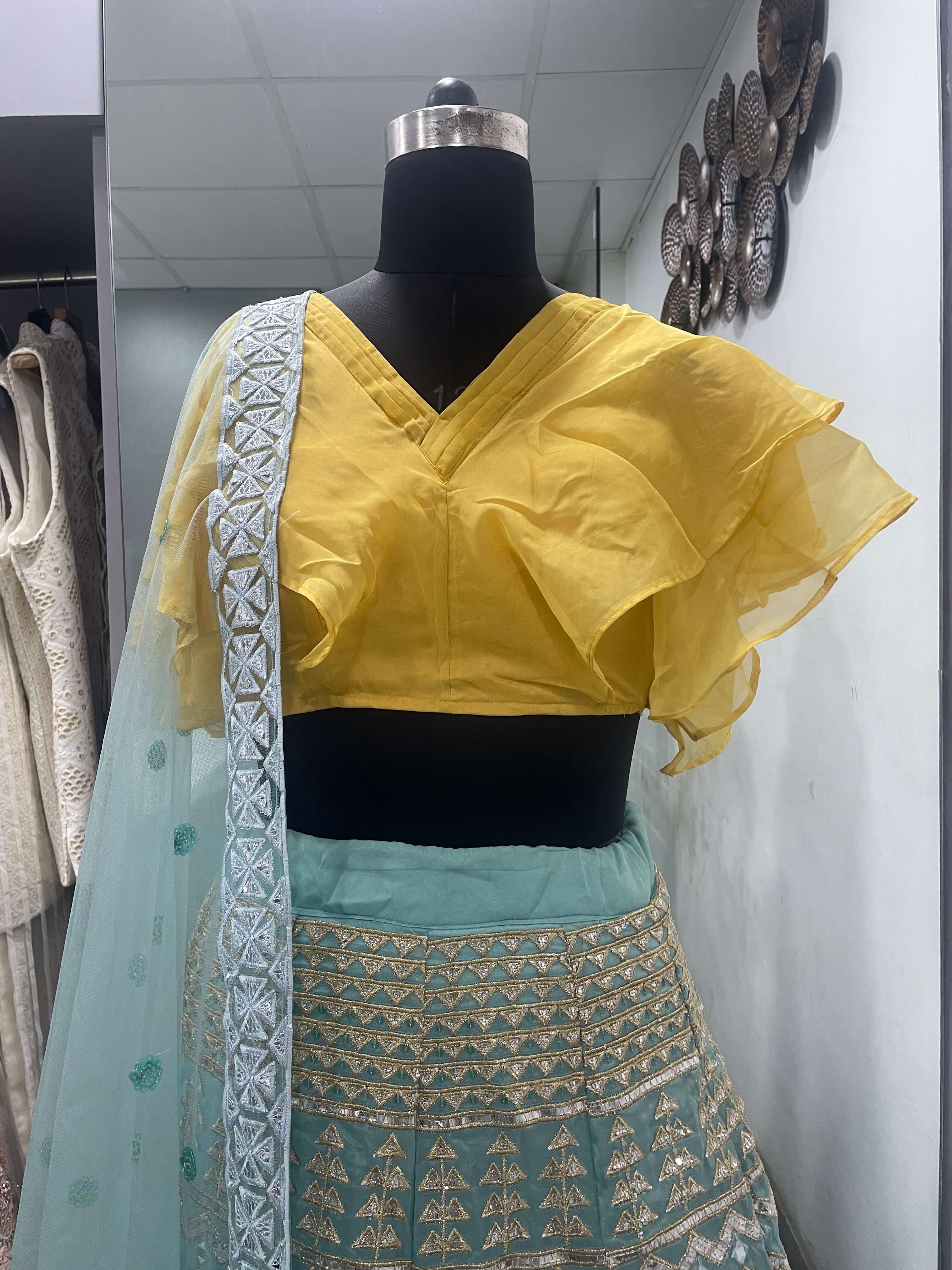 Turquoise Lehenga Choli in Organza With Thread And Sequence Work