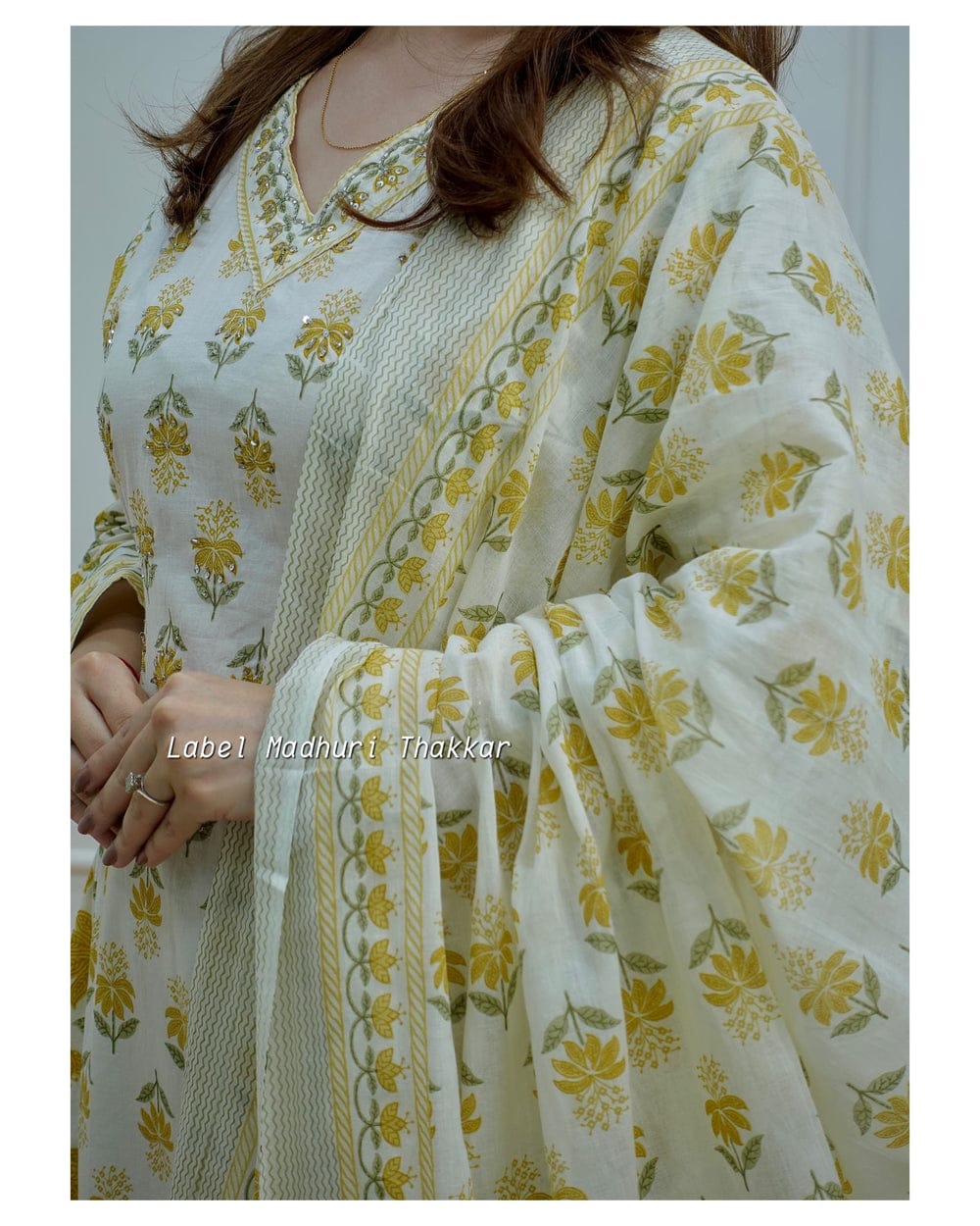 White Floral Afghani Suit Set with Side Waist Tassels and Motifs
