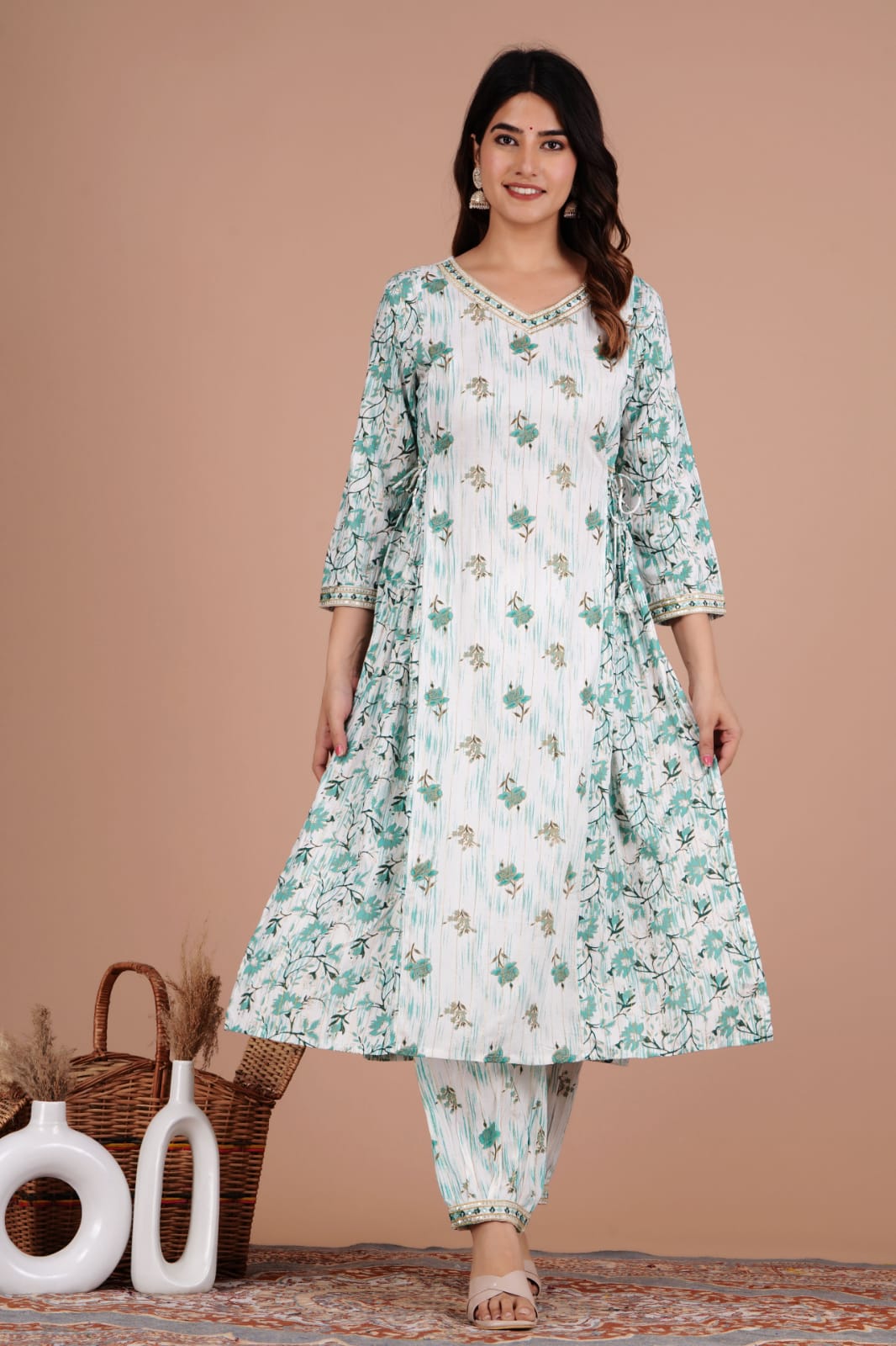 Enchanting Green Floral Afghani Suit Set: Handwork, Tassels, and Motifs