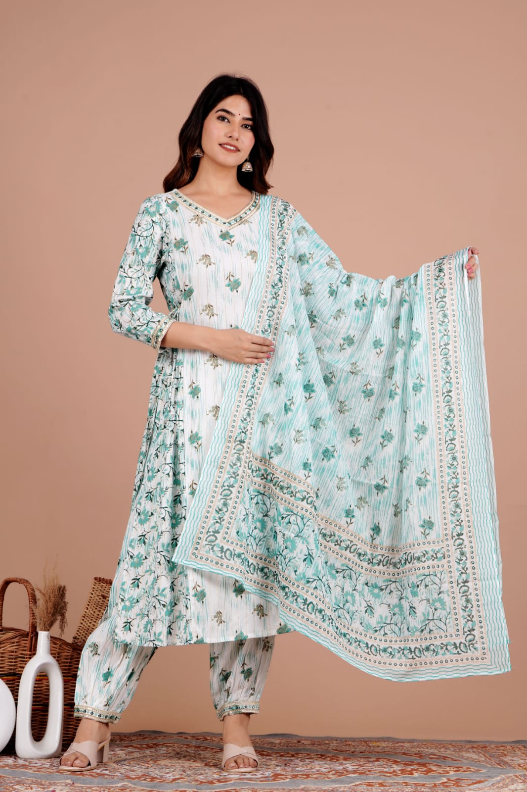 Enchanting Green Floral Afghani Suit Set: Handwork, Tassels, and Motifs