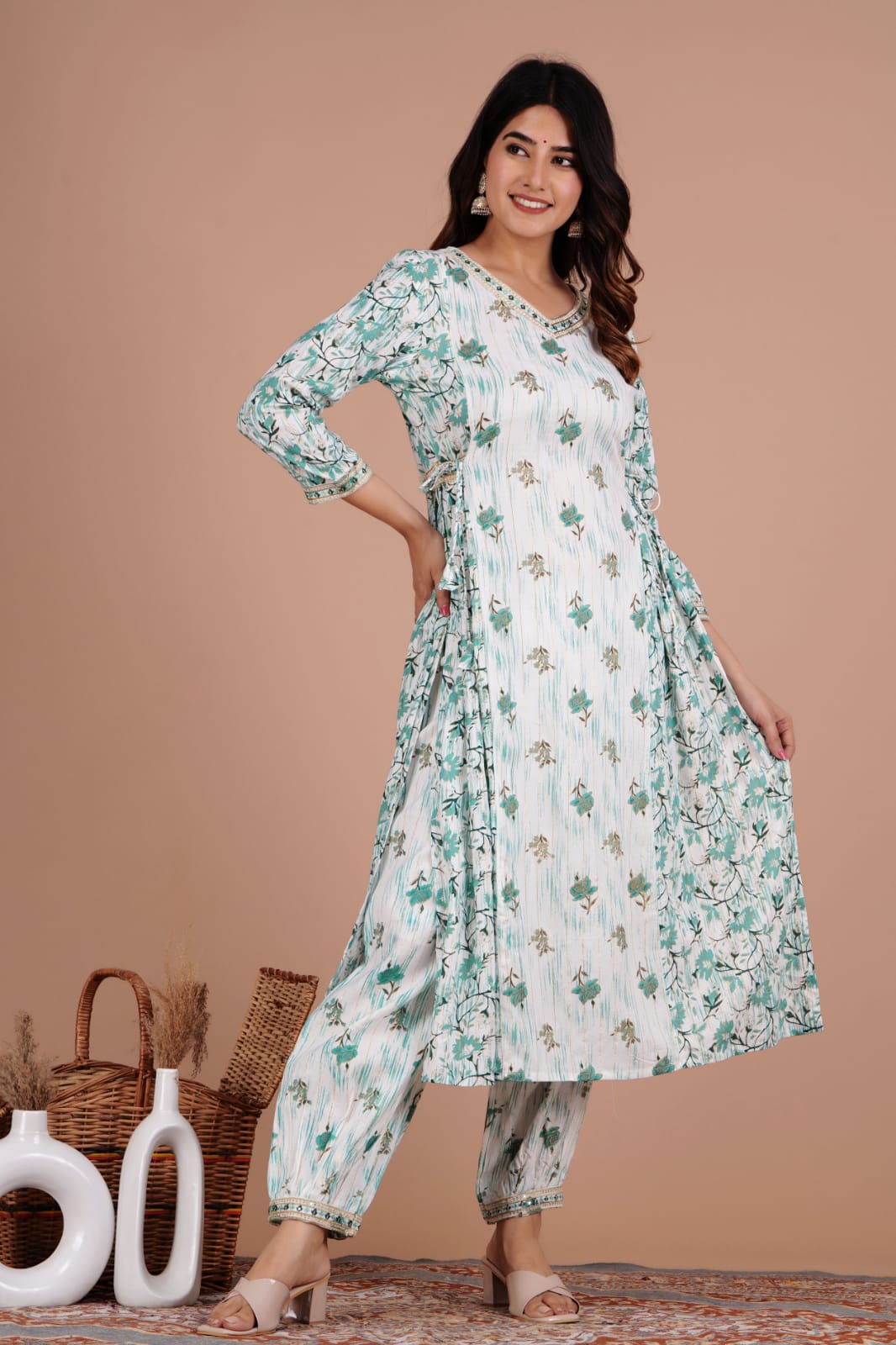 Enchanting Green Floral Afghani Suit Set: Handwork, Tassels, and Motifs