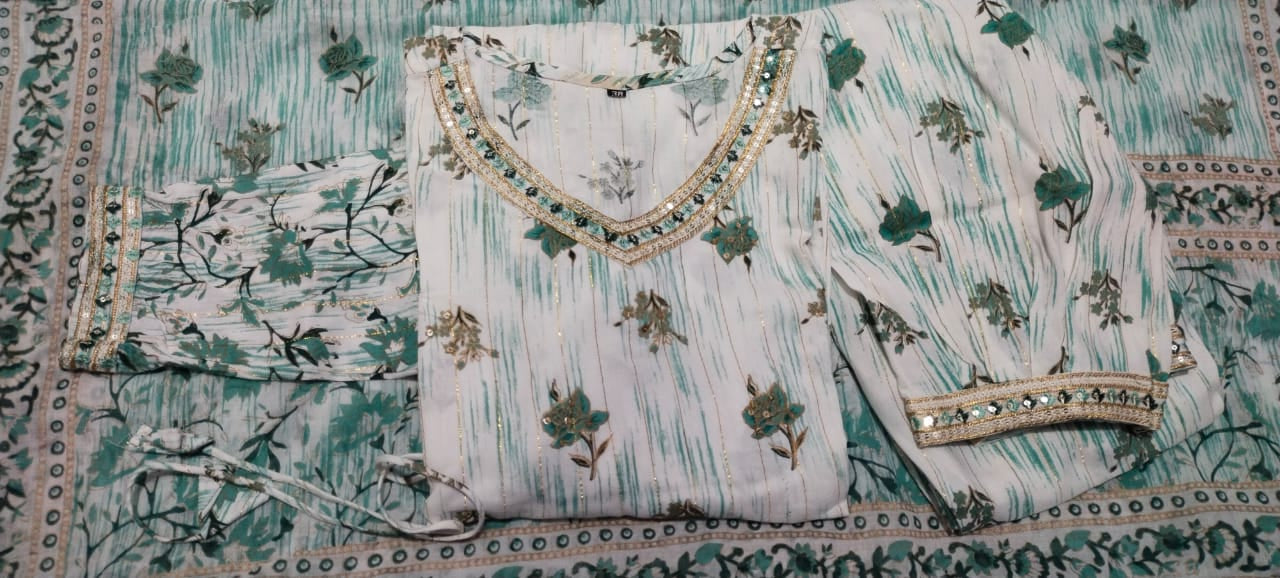 Enchanting Green Floral Afghani Suit Set: Handwork, Tassels, and Motifs