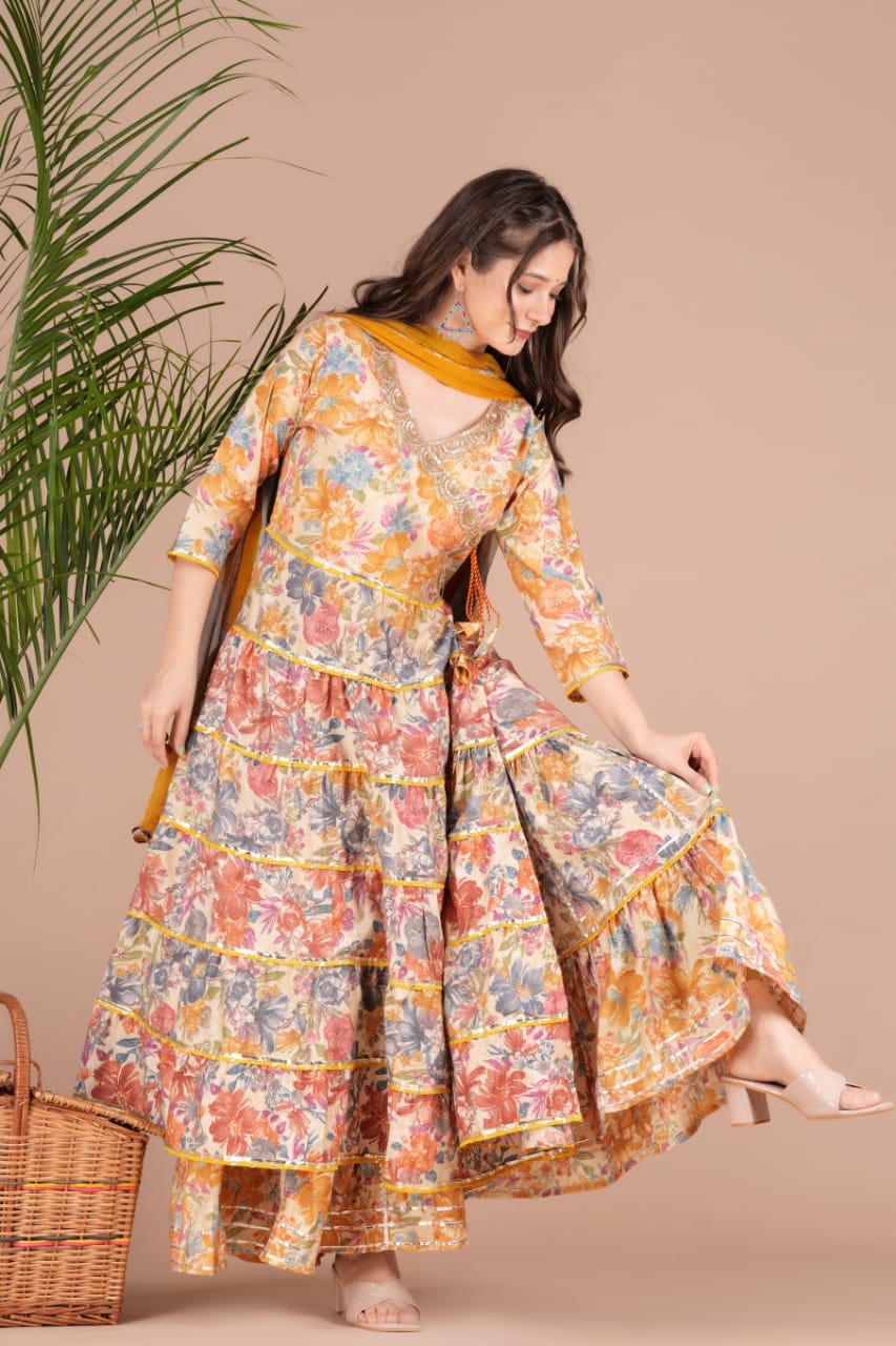 Golden Sequence Muslin Sharara Set with Sidelong Slit Kurti and Chiffon Tie-n-Dye Dupatta