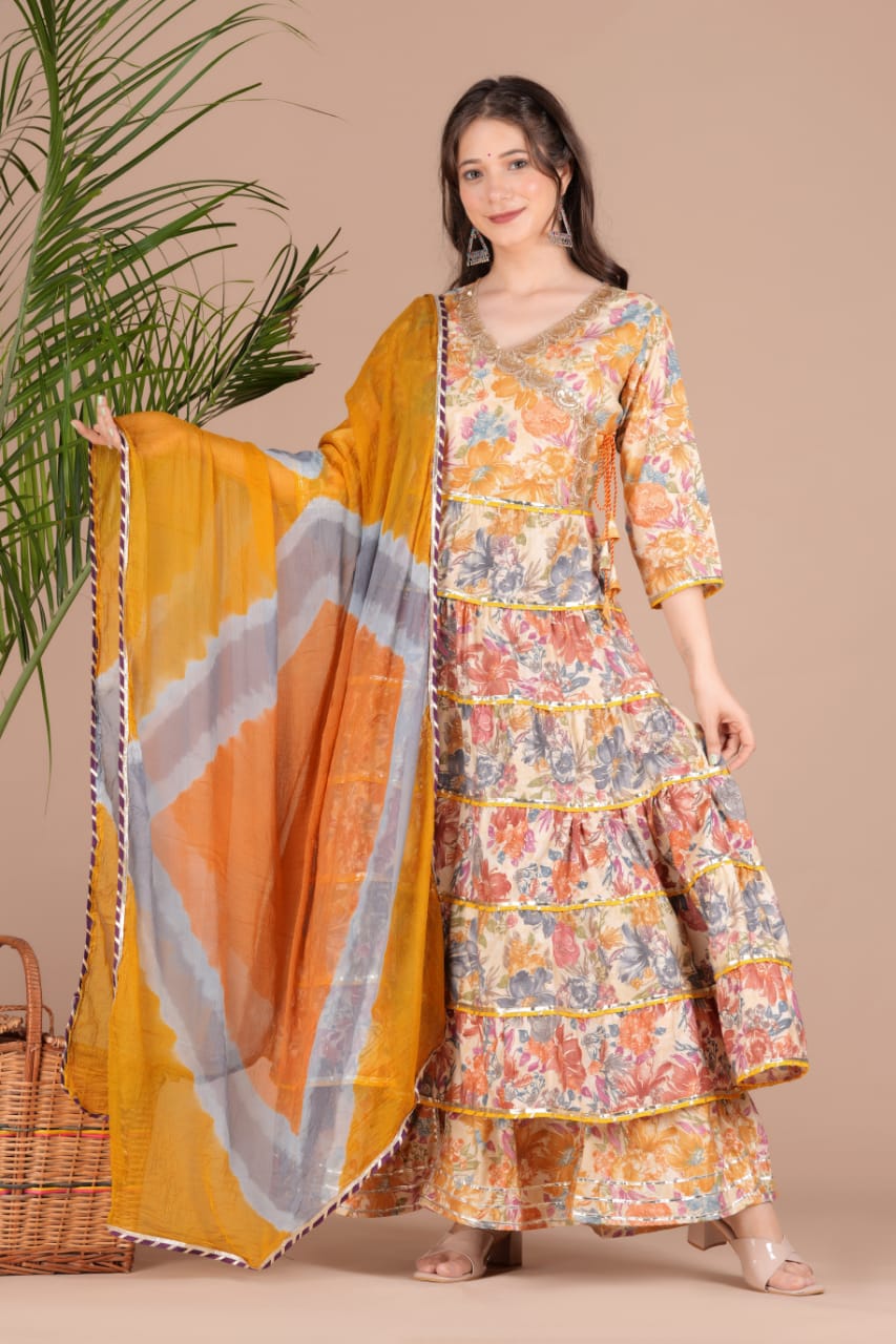 Golden Sequence Muslin Sharara Set with Sidelong Slit Kurti and Chiffon Tie-n-Dye Dupatta