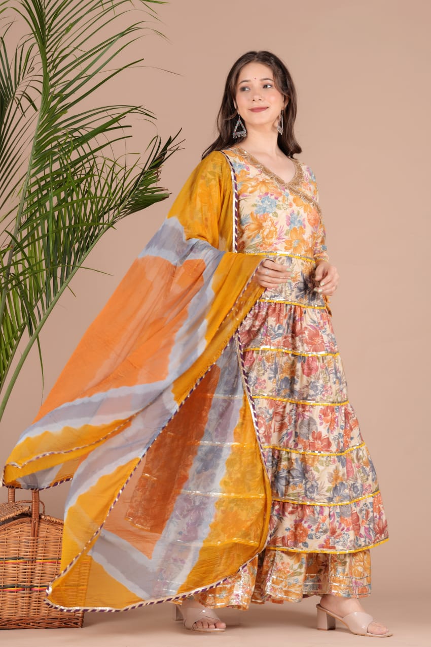 Golden Sequence Muslin Sharara Set with Sidelong Slit Kurti and Chiffon Tie-n-Dye Dupatta