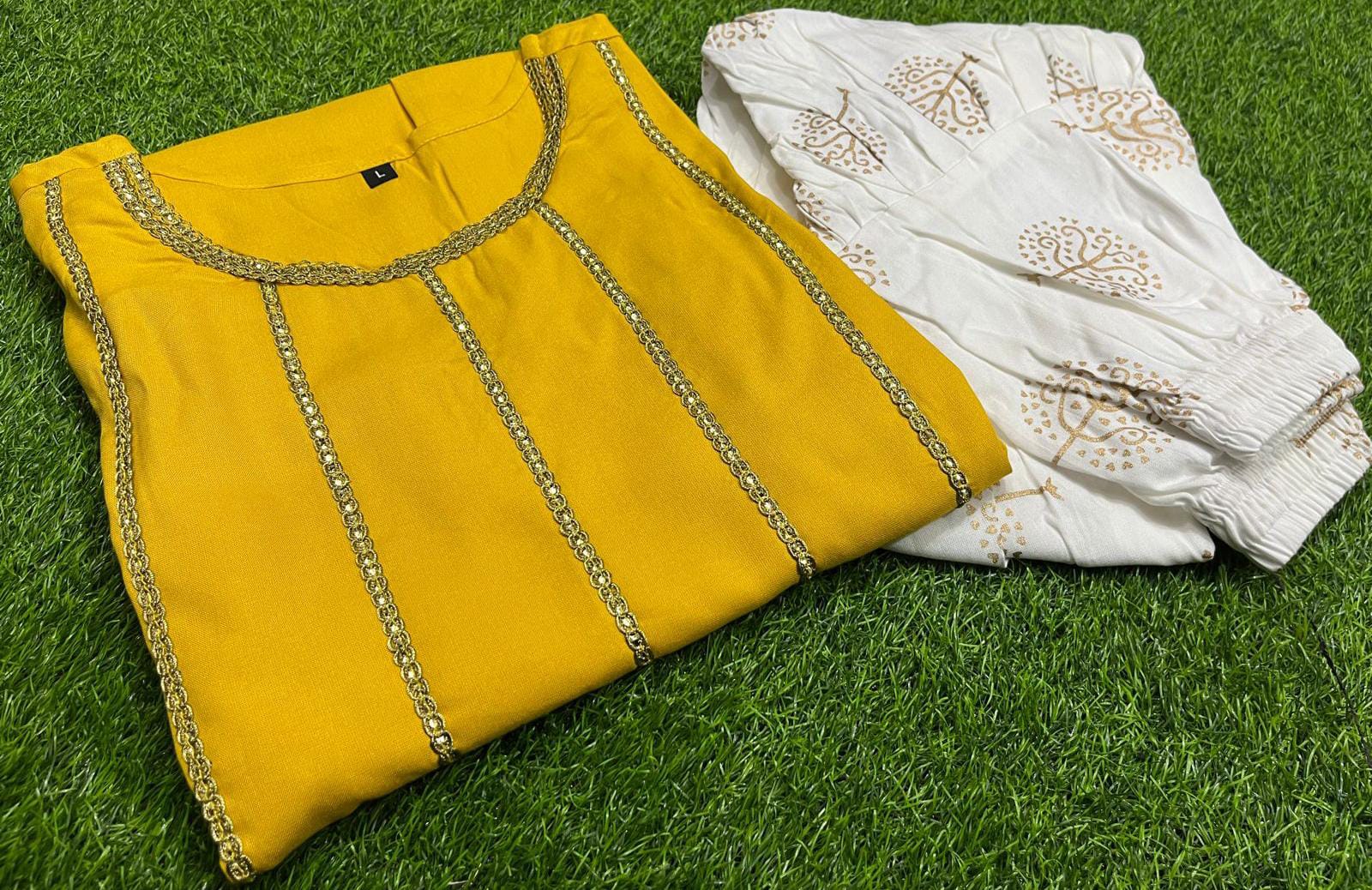 Lacework Cut Shoulder Top and Printed Dhoti Set in Rayon