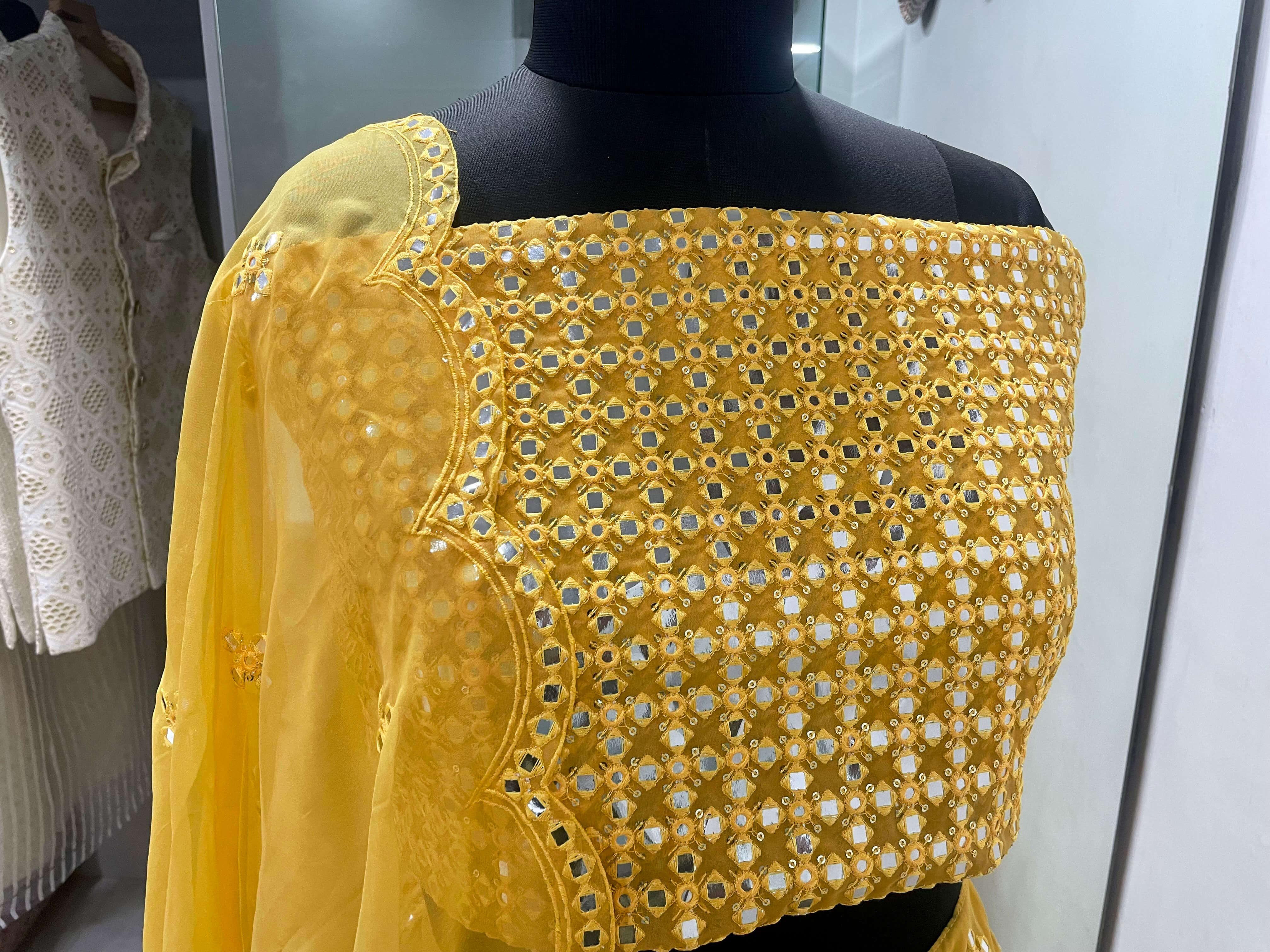 Yellow Embroidered Semi-Stitched Lehenga In Pure Organza