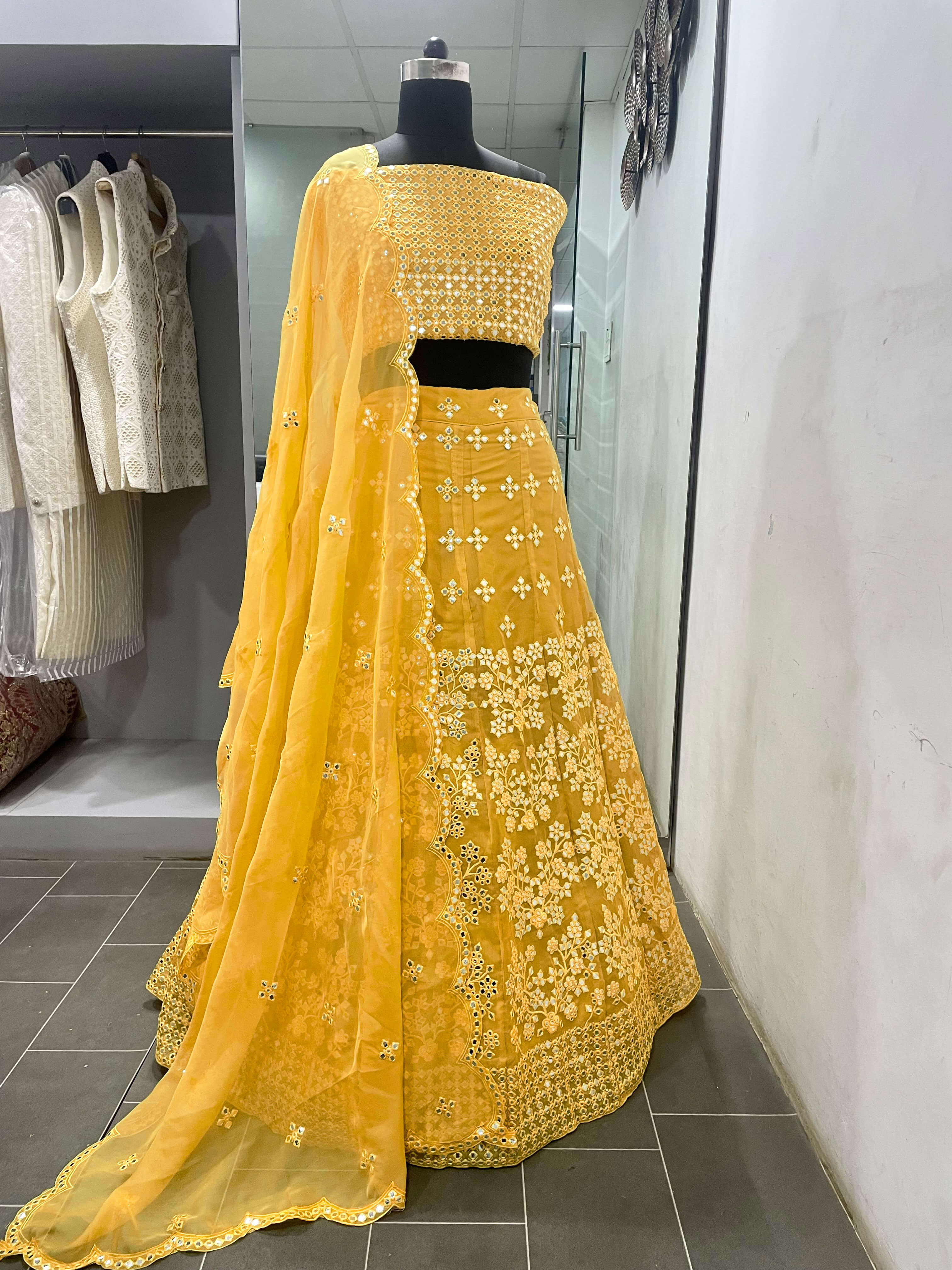 Yellow Embroidered Semi-Stitched Lehenga In Pure Organza
