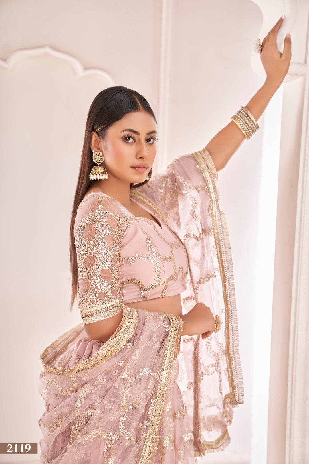 Baby Pink Elegant Butterfly Net Lehenga with Zari & Sequence Embroidery