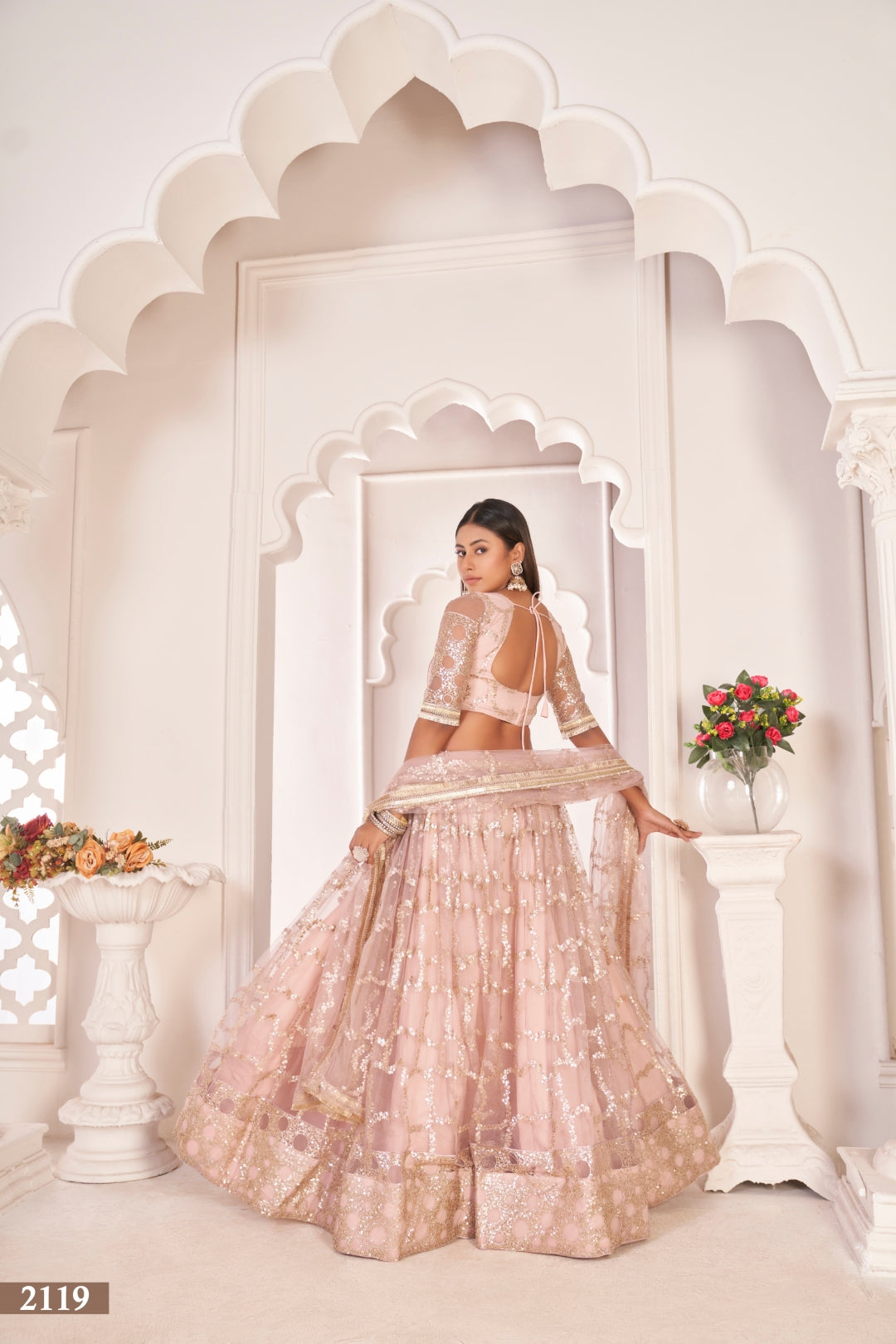 Baby Pink Elegant Butterfly Net Lehenga with Zari & Sequence Embroidery