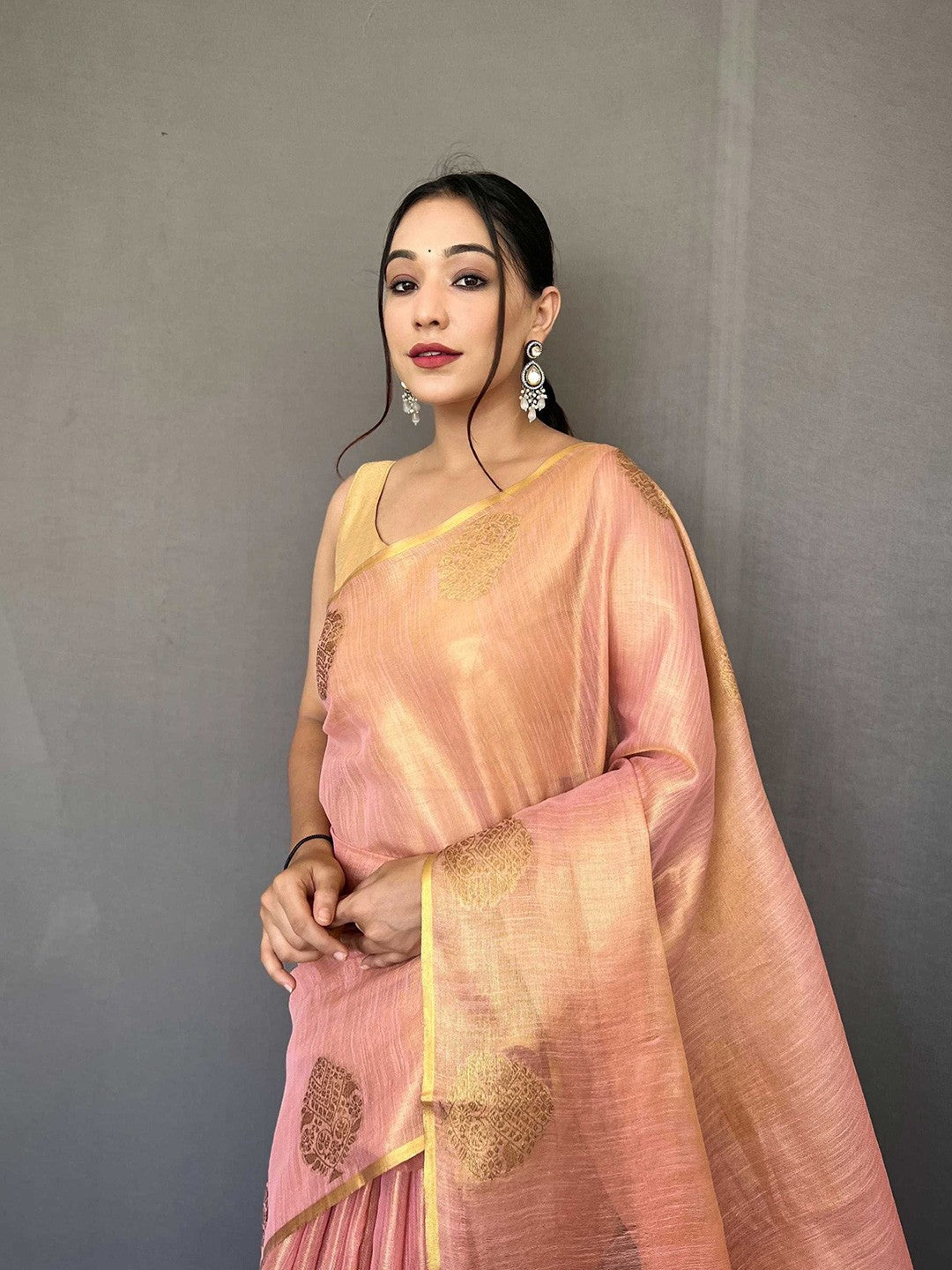 Baby Pink Elegant Woven Tissue Silk Saree with Gold Accents Party & Festive Wear