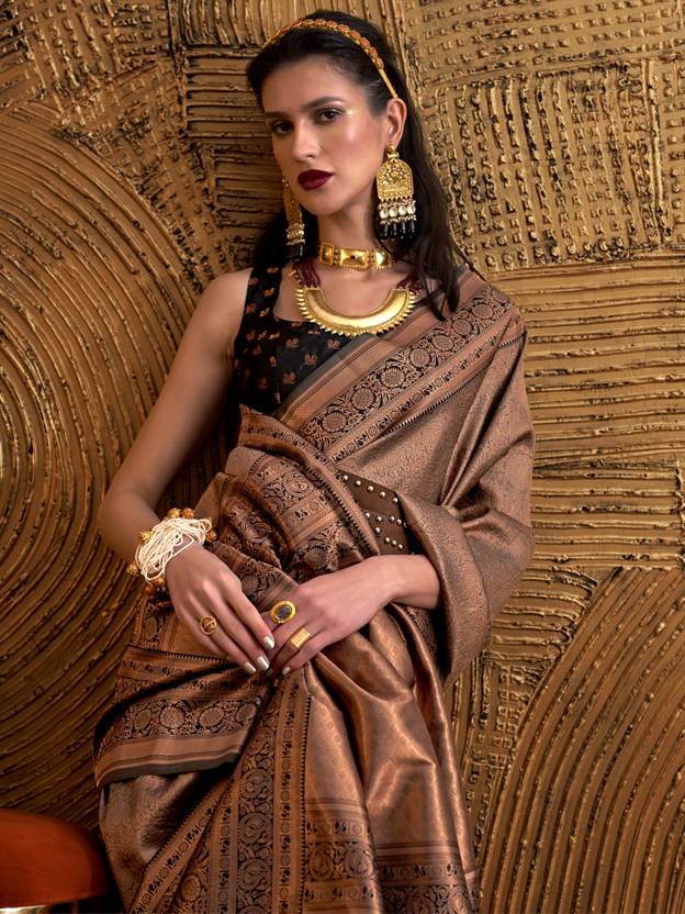 Brown Elegant Banarasi Silk Blend Woven Saree with Tassel Detailing