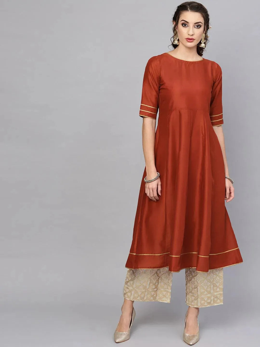 Anouk Brown Solid Muslin Anarkali Kurta With Palazzos