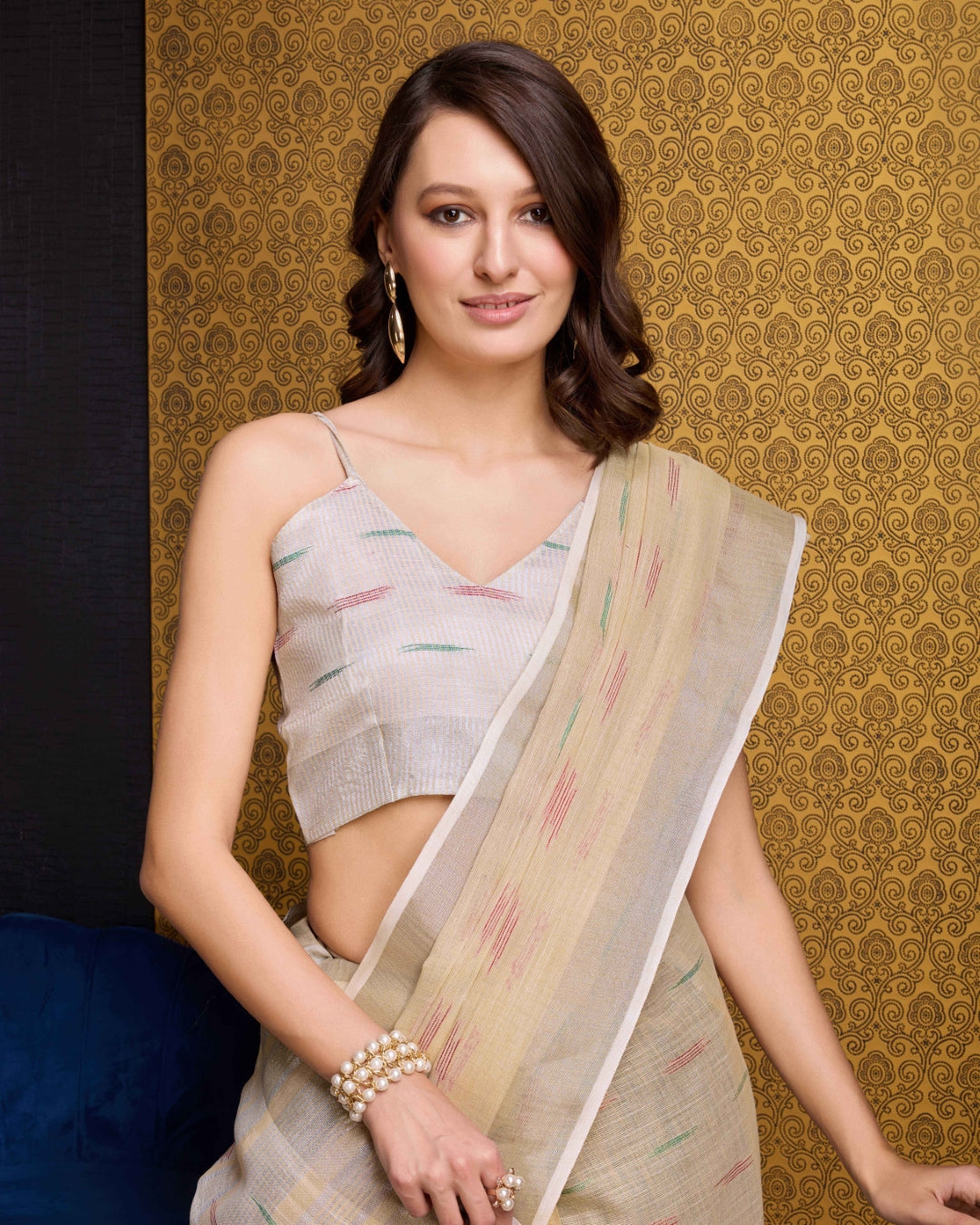 Chiku Elegant & Gold-Toned Ikat Woven Saree with Zari Border