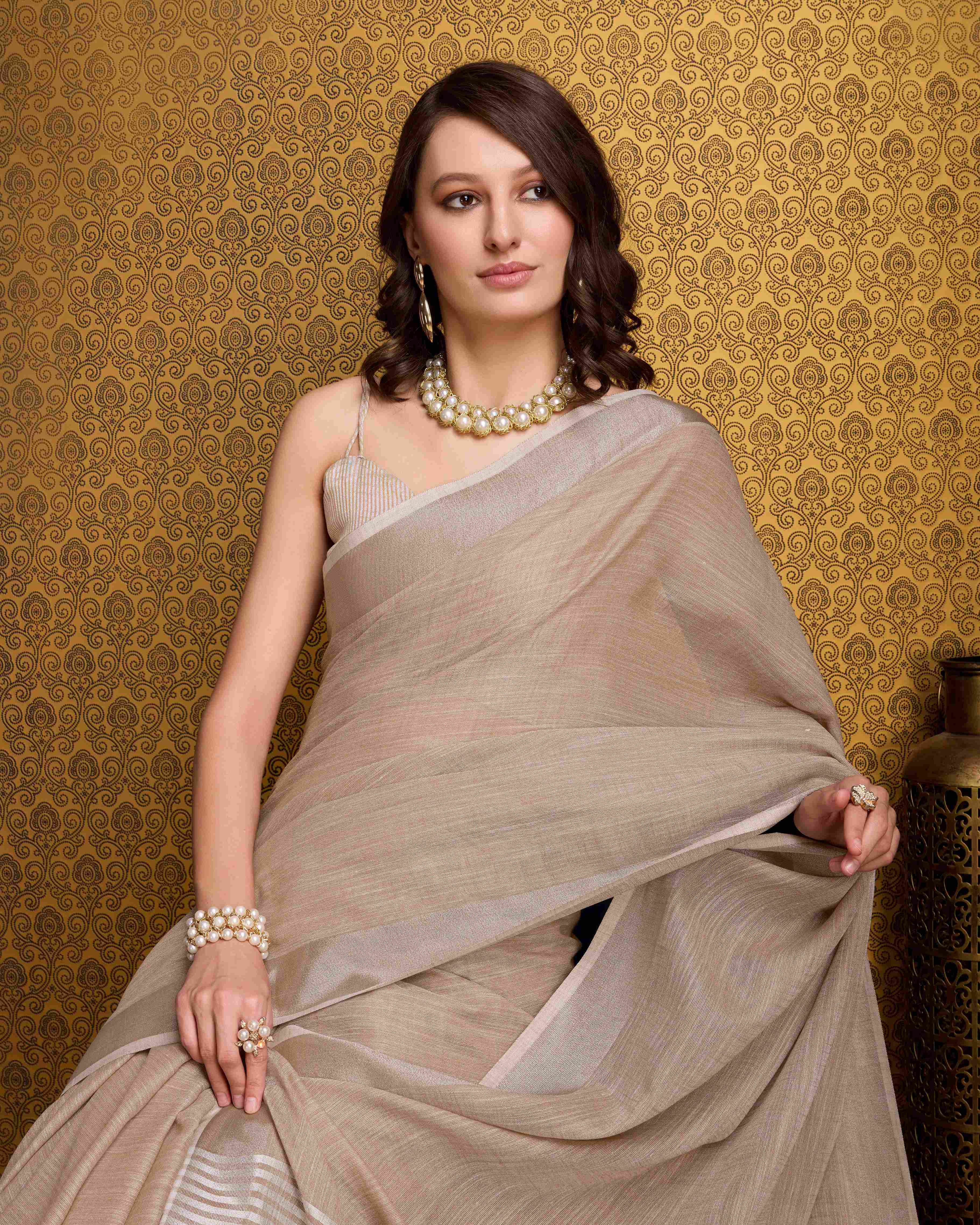 Chiku Elegant Solid Saree with Zari Border – Timeless Grace