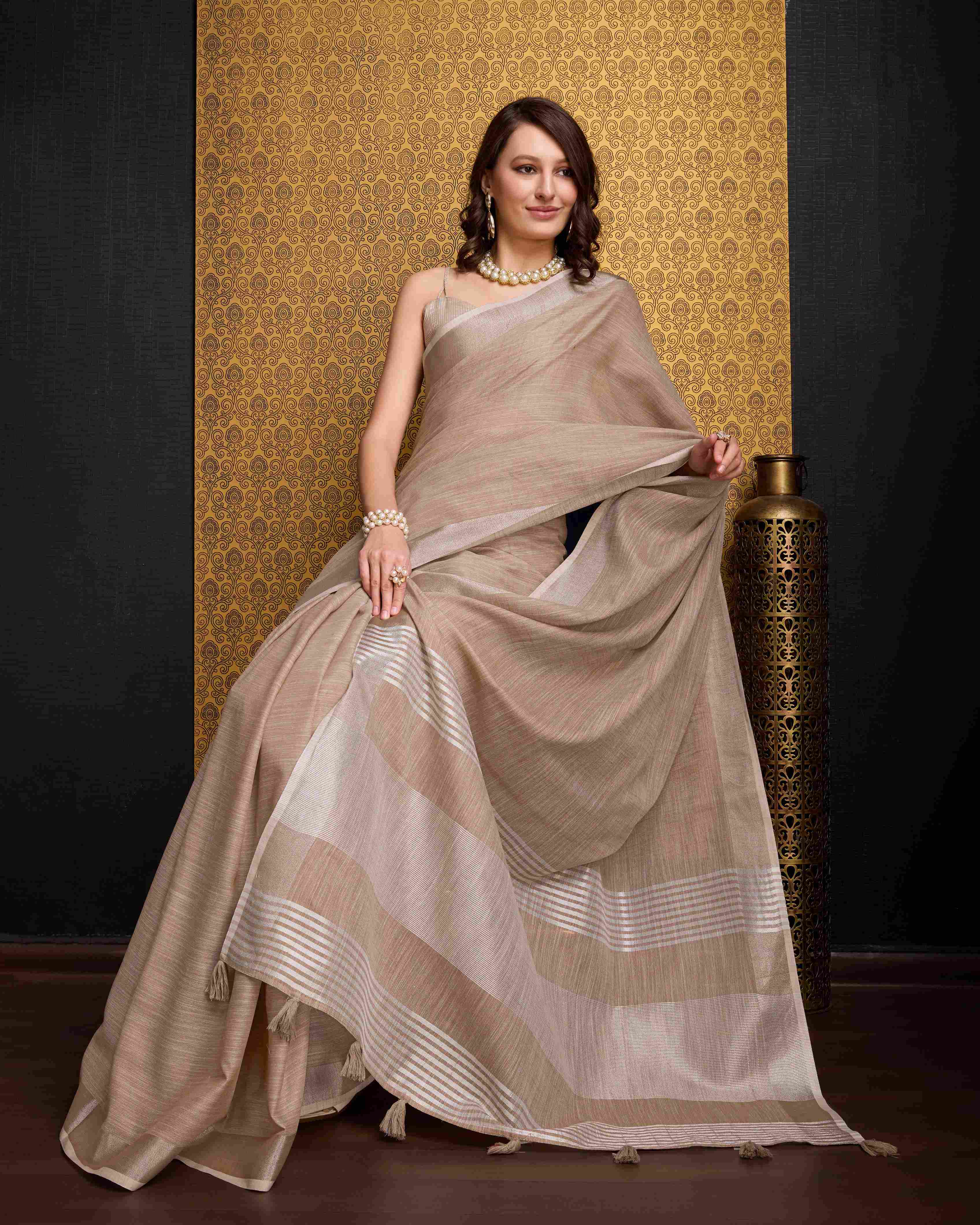 Chiku Elegant Solid Saree with Zari Border – Timeless Grace