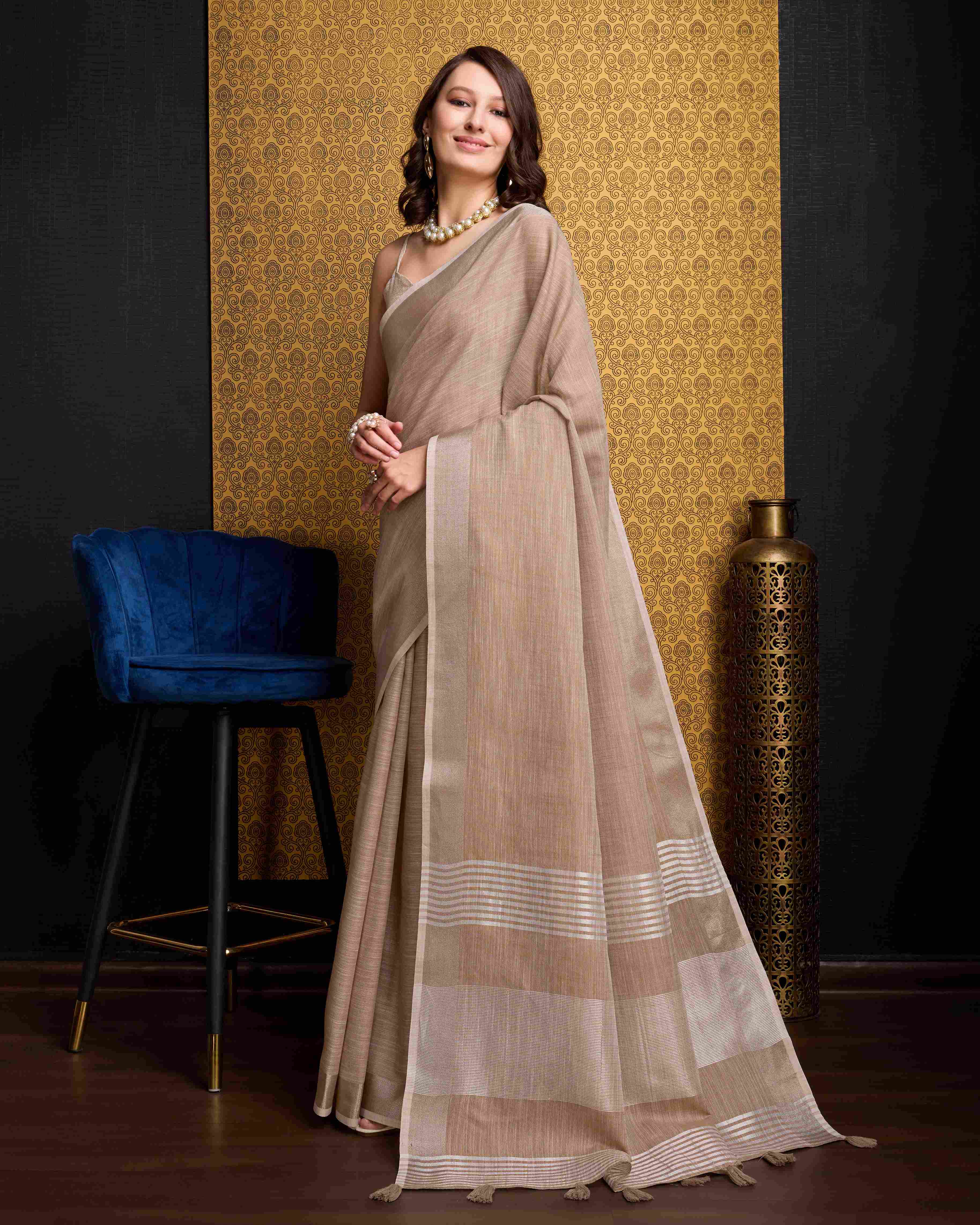 Chiku Elegant Solid Saree with Zari Border – Timeless Grace