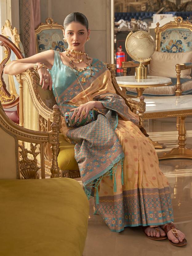 Chiku Graceful Woven Banarasi Silk Blend Saree with Tassel Detailing