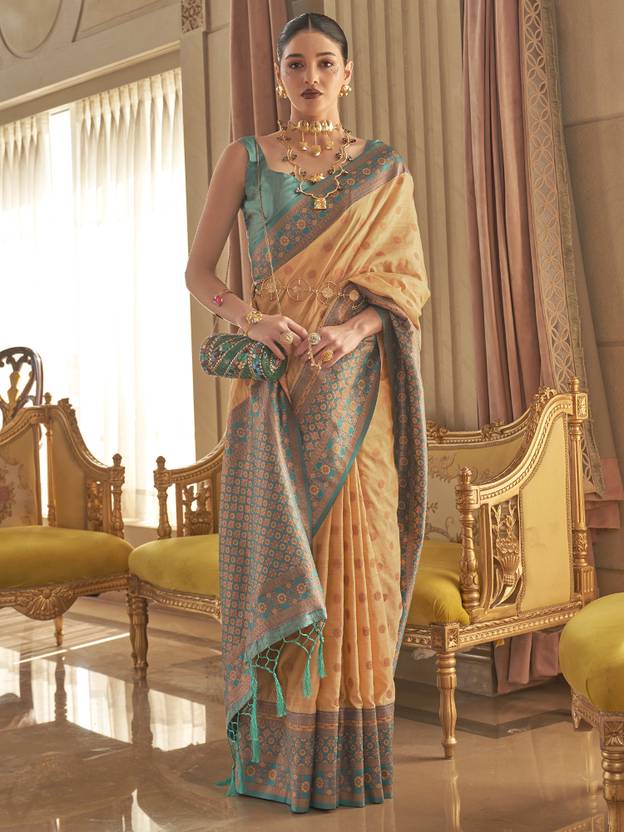 Chiku Graceful Woven Banarasi Silk Blend Saree with Tassel Detailing
