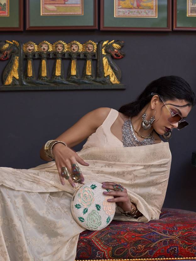 Cream Banarasi Silk Blend Saree with Bidri Work & Zari Buta – Gold Accents & Tassel Detailing