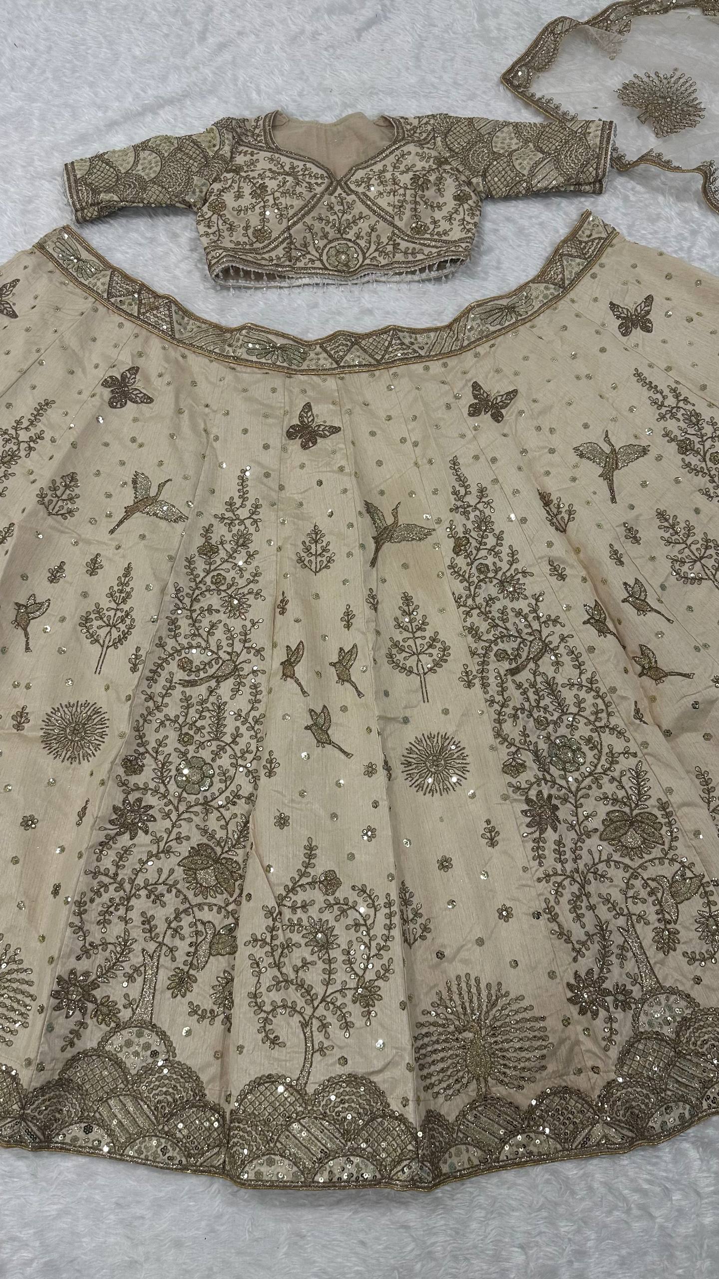 Cream Heavy Slub Silk Lehenga with Sequins, Dori & Zari Work, Matching Blouse & Net Dupatta