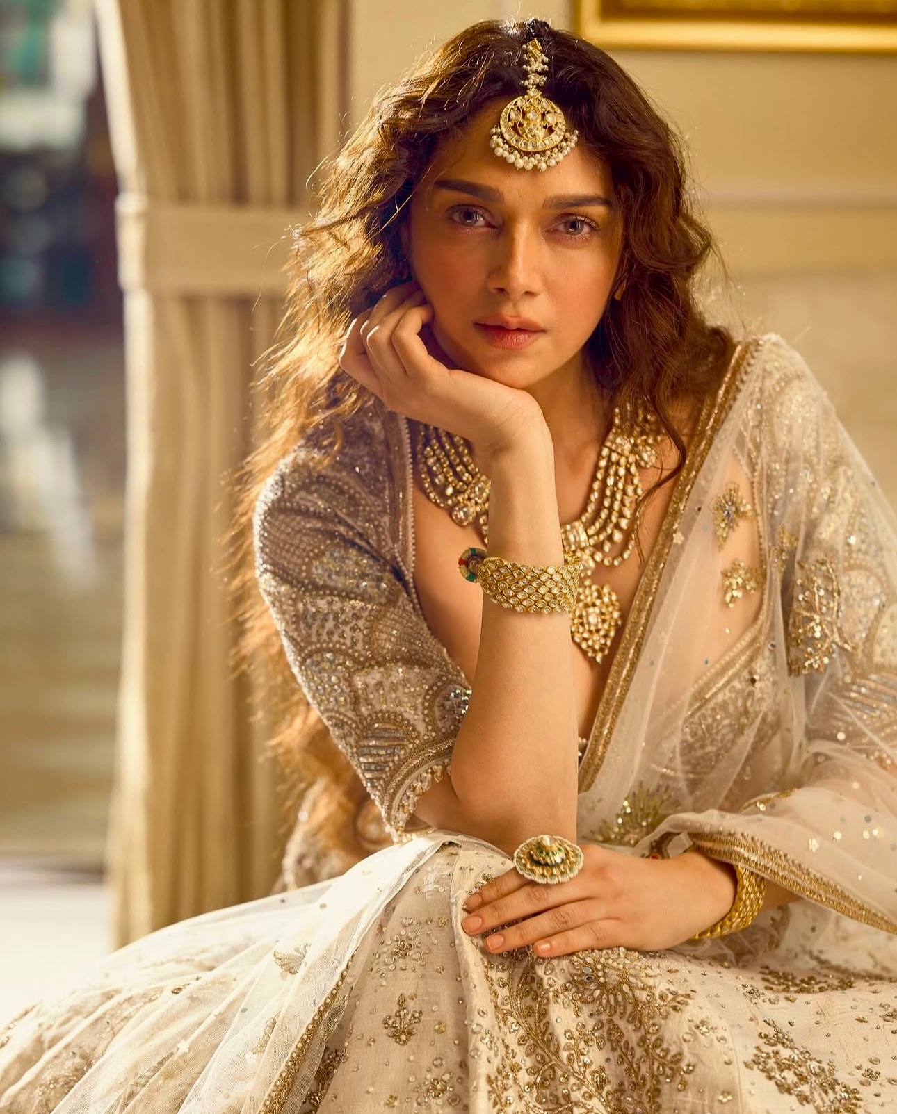 Cream Heavy Slub Silk Lehenga with Sequins, Dori & Zari Work, Matching Blouse & Net Dupatta