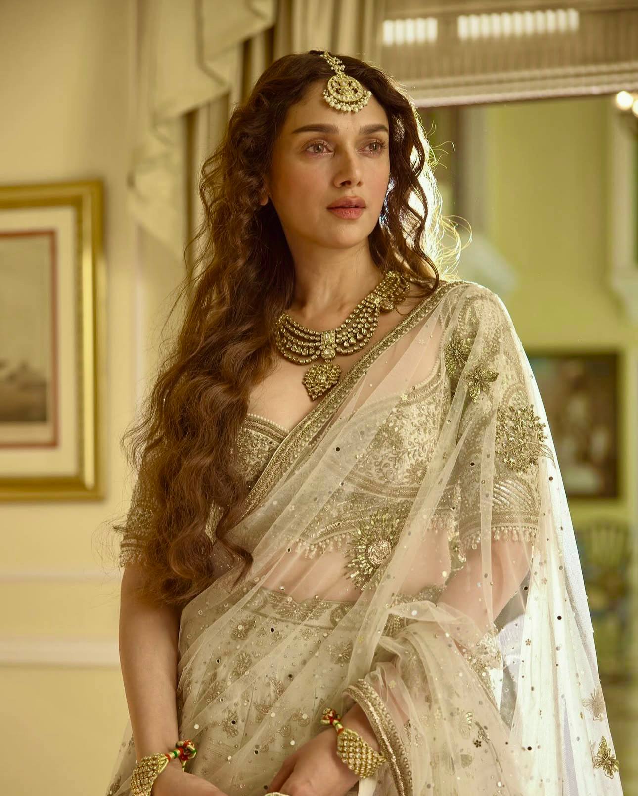 Cream Heavy Slub Silk Lehenga with Sequins, Dori & Zari Work, Matching Blouse & Net Dupatta