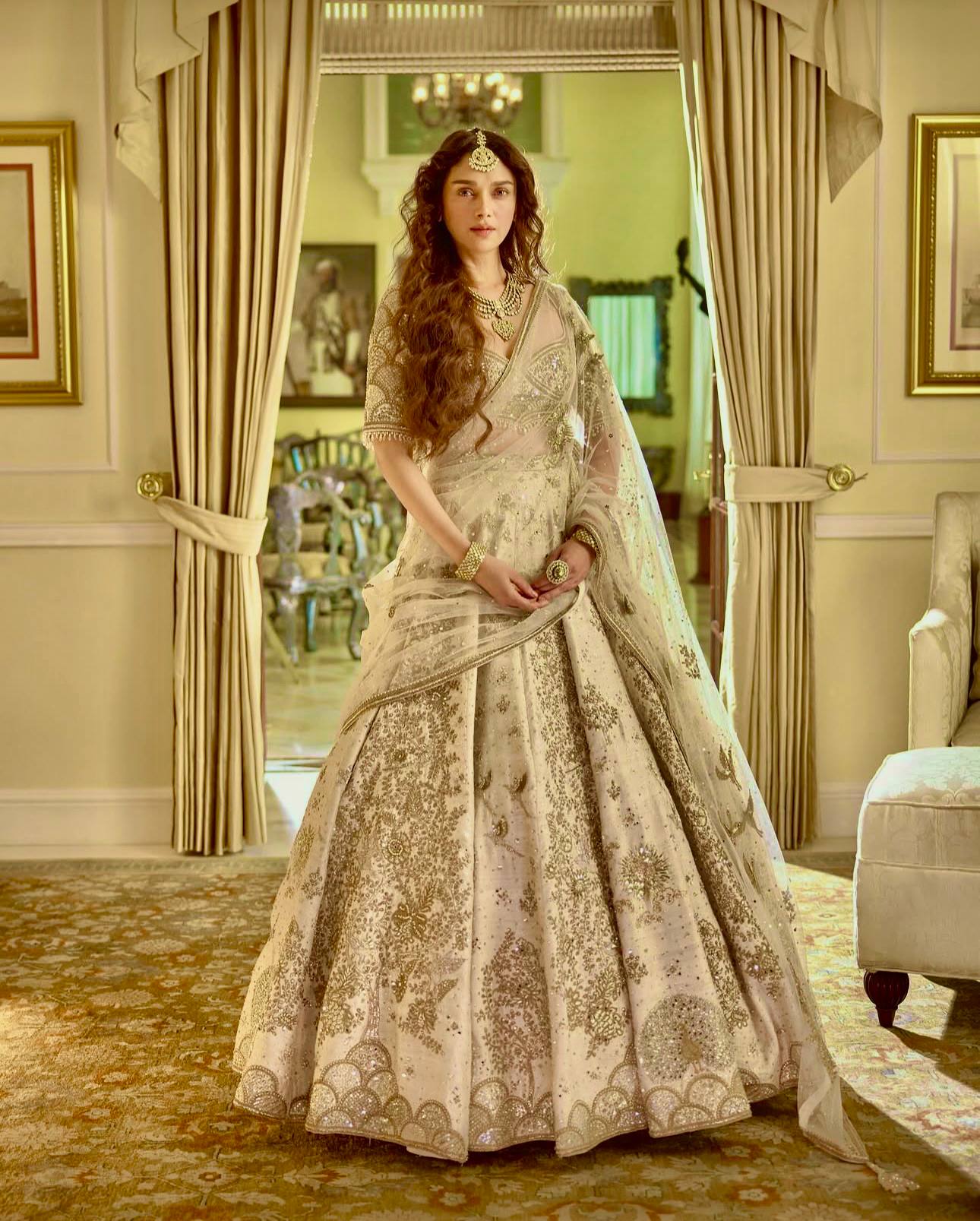 Cream Heavy Slub Silk Lehenga with Sequins, Dori & Zari Work, Matching Blouse & Net Dupatta
