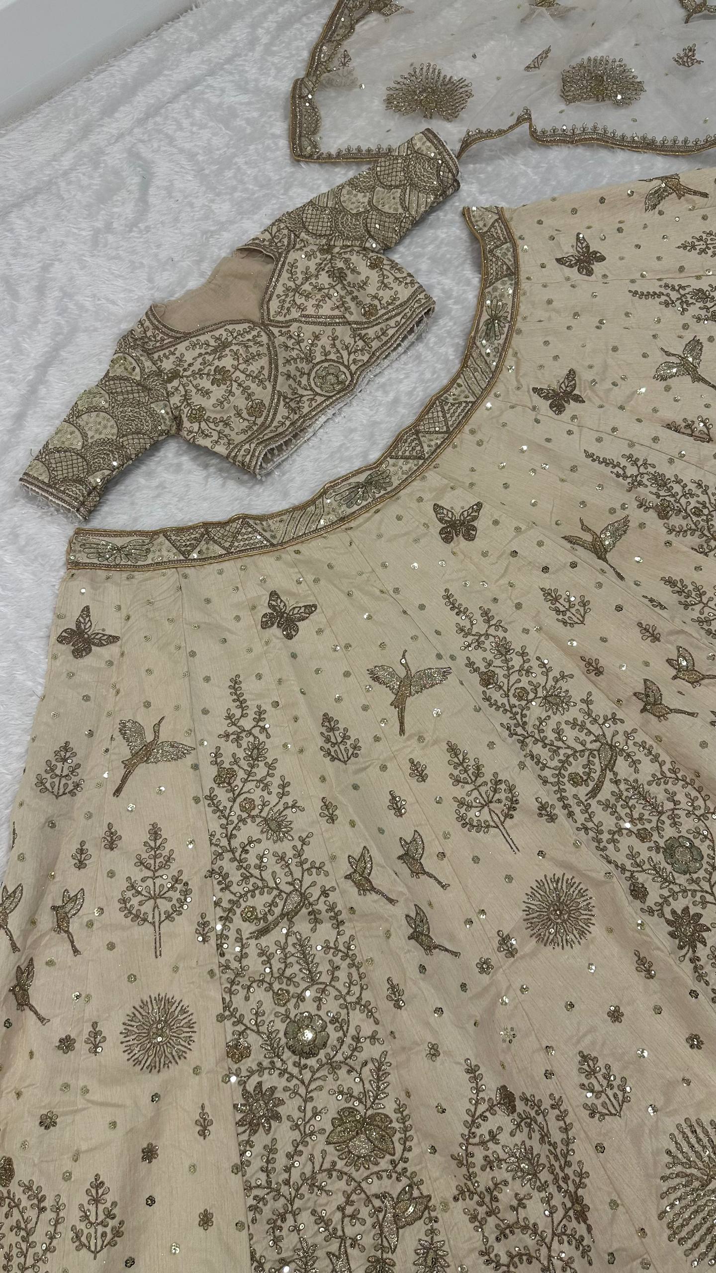 Cream Heavy Slub Silk Lehenga with Sequins, Dori & Zari Work, Matching Blouse & Net Dupatta