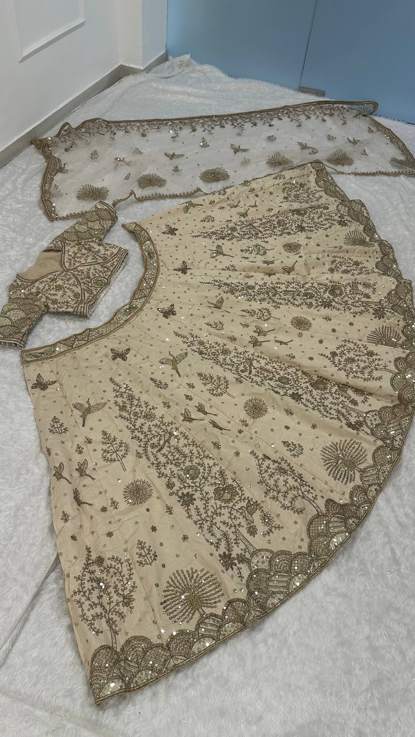 Cream Heavy Slub Silk Lehenga with Sequins, Dori & Zari Work, Matching Blouse & Net Dupatta