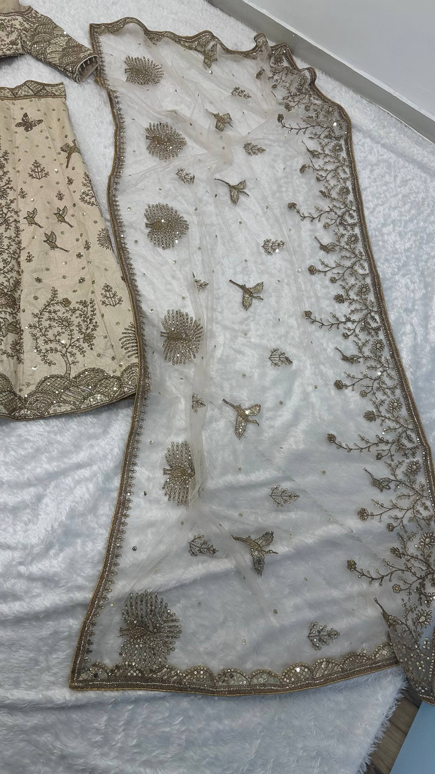 Cream Heavy Slub Silk Lehenga with Sequins, Dori & Zari Work, Matching Blouse & Net Dupatta