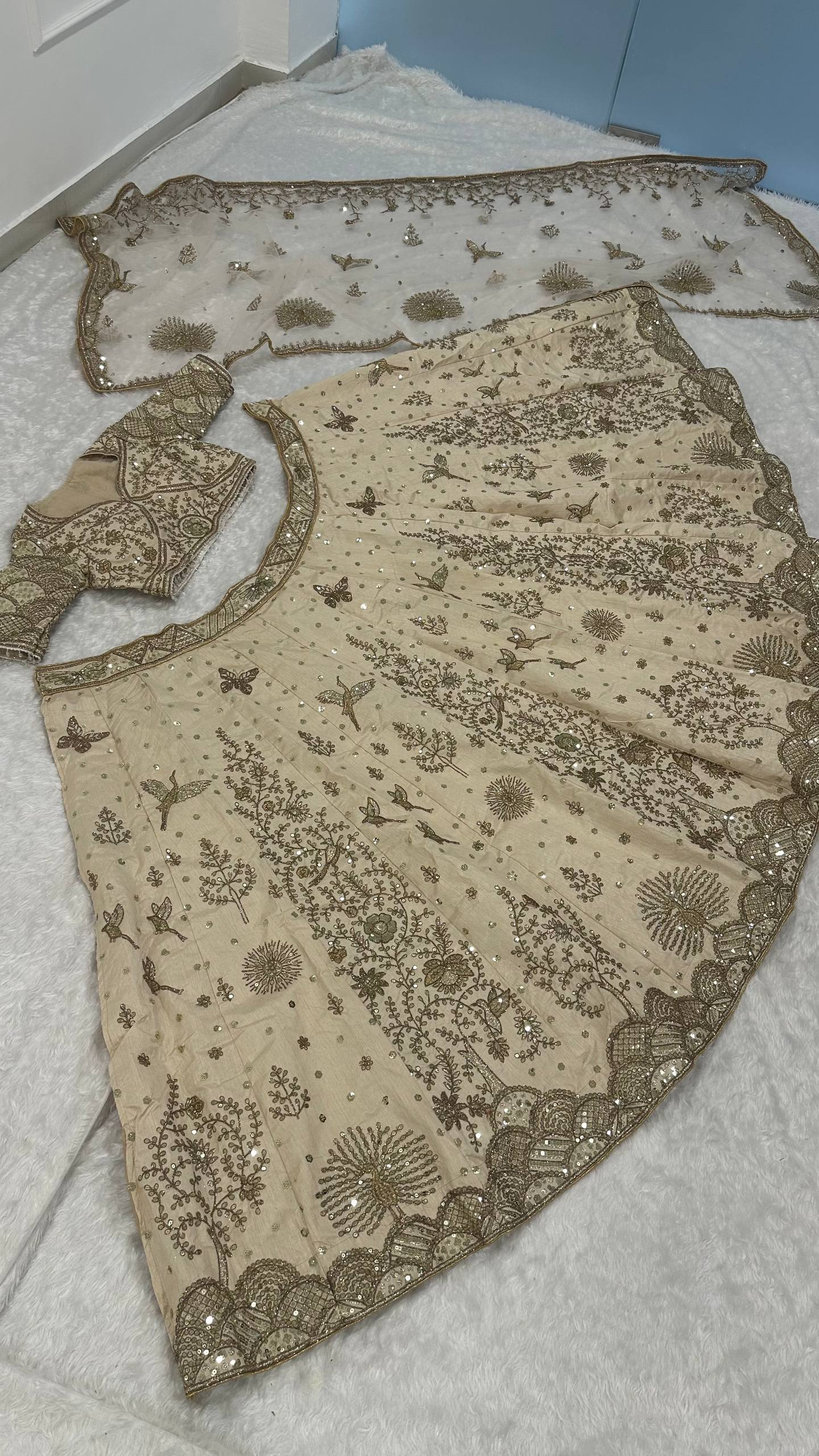 Cream Heavy Slub Silk Lehenga with Sequins, Dori & Zari Work, Matching Blouse & Net Dupatta