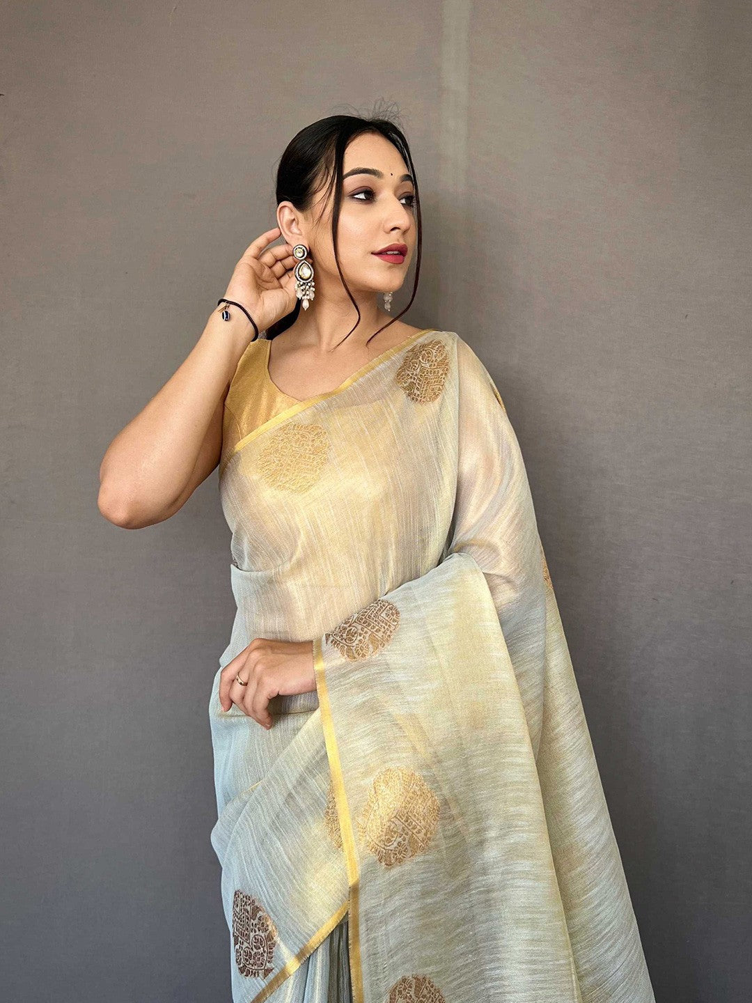 Dusty Blue Elegant Woven Tissue Silk Saree with Gold Accents Party & Festive Wear