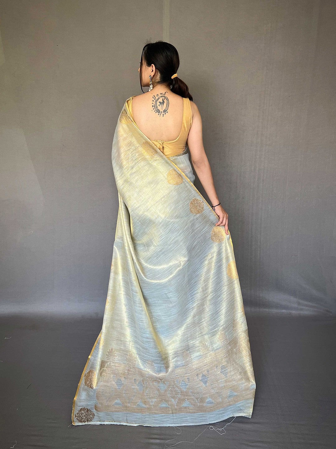 Dusty Blue Elegant Woven Tissue Silk Saree with Gold Accents Party & Festive Wear