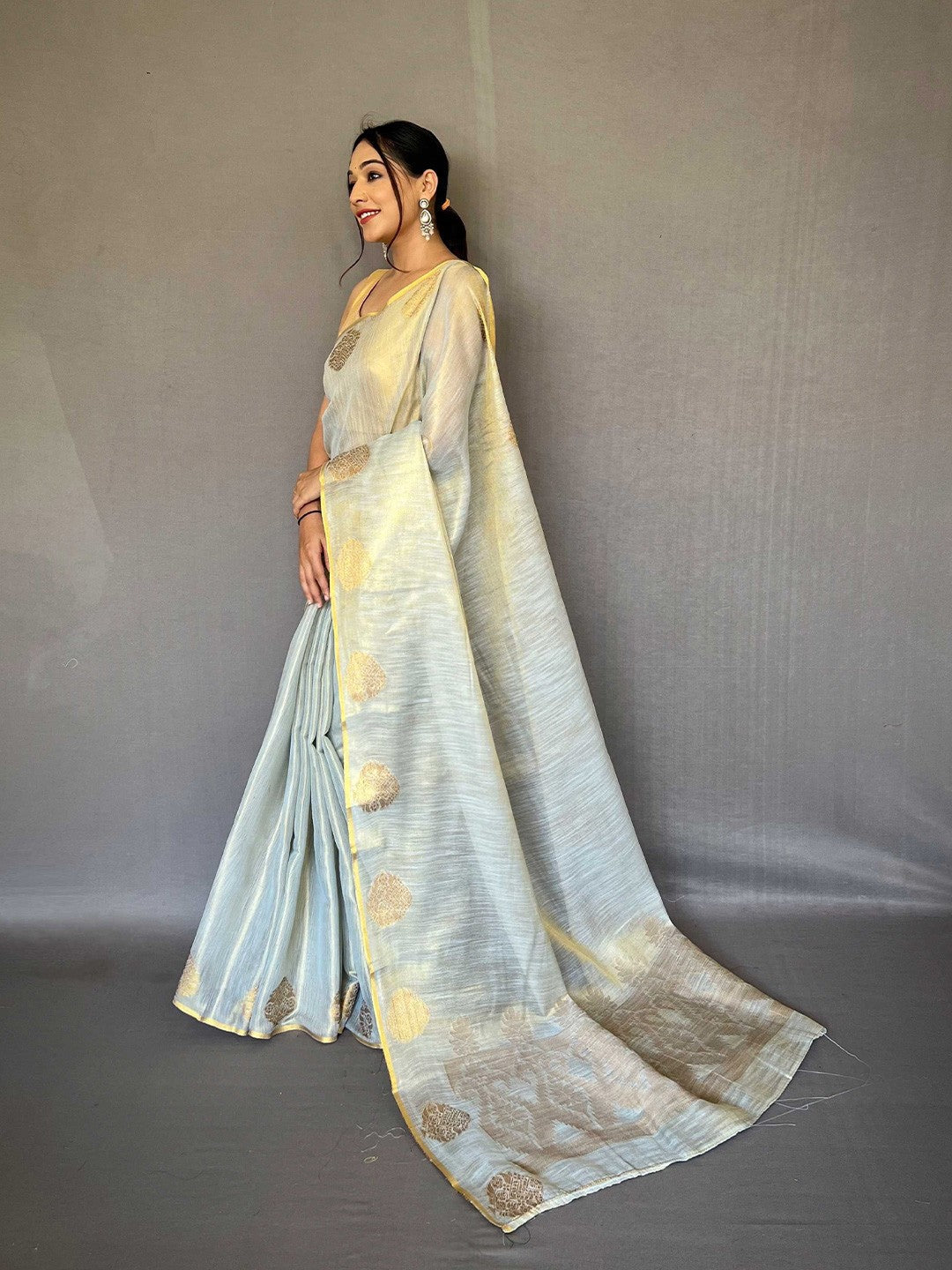 Dusty Blue Elegant Woven Tissue Silk Saree with Gold Accents Party & Festive Wear
