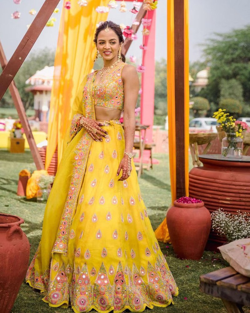 Enthralling Georgette Yellow Lehenga Choli Set with Mirror Embroidery