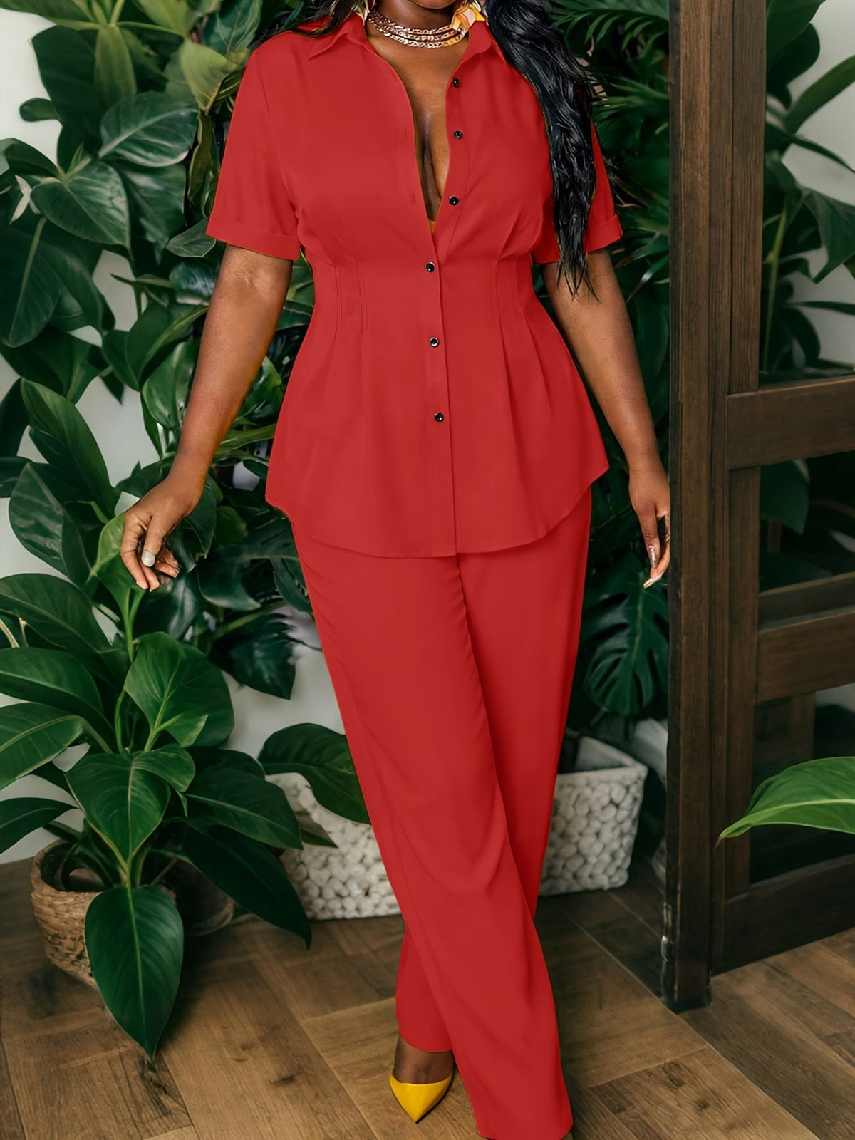 Two-Piece Set Featuring a Chic Top And Relaxed Long Pants